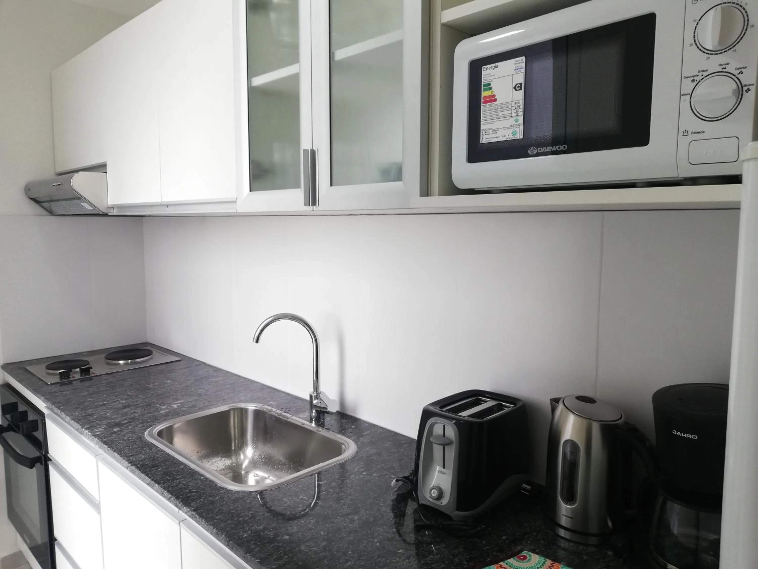 Kitchen or kitchenette in Ramada Residences by Wyndham Puerto Madryn CQ Mitre