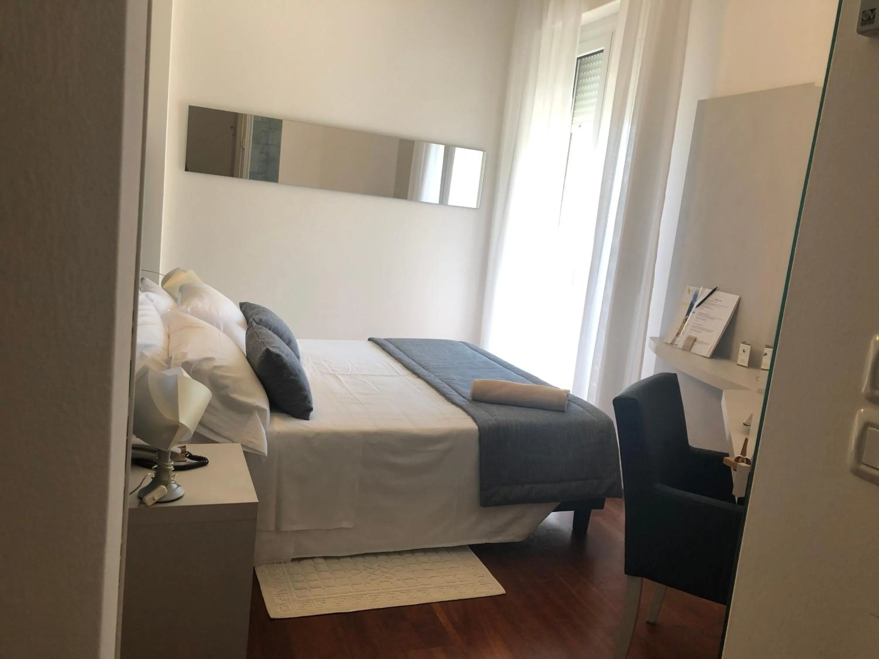 Bed in Hotel Alexander