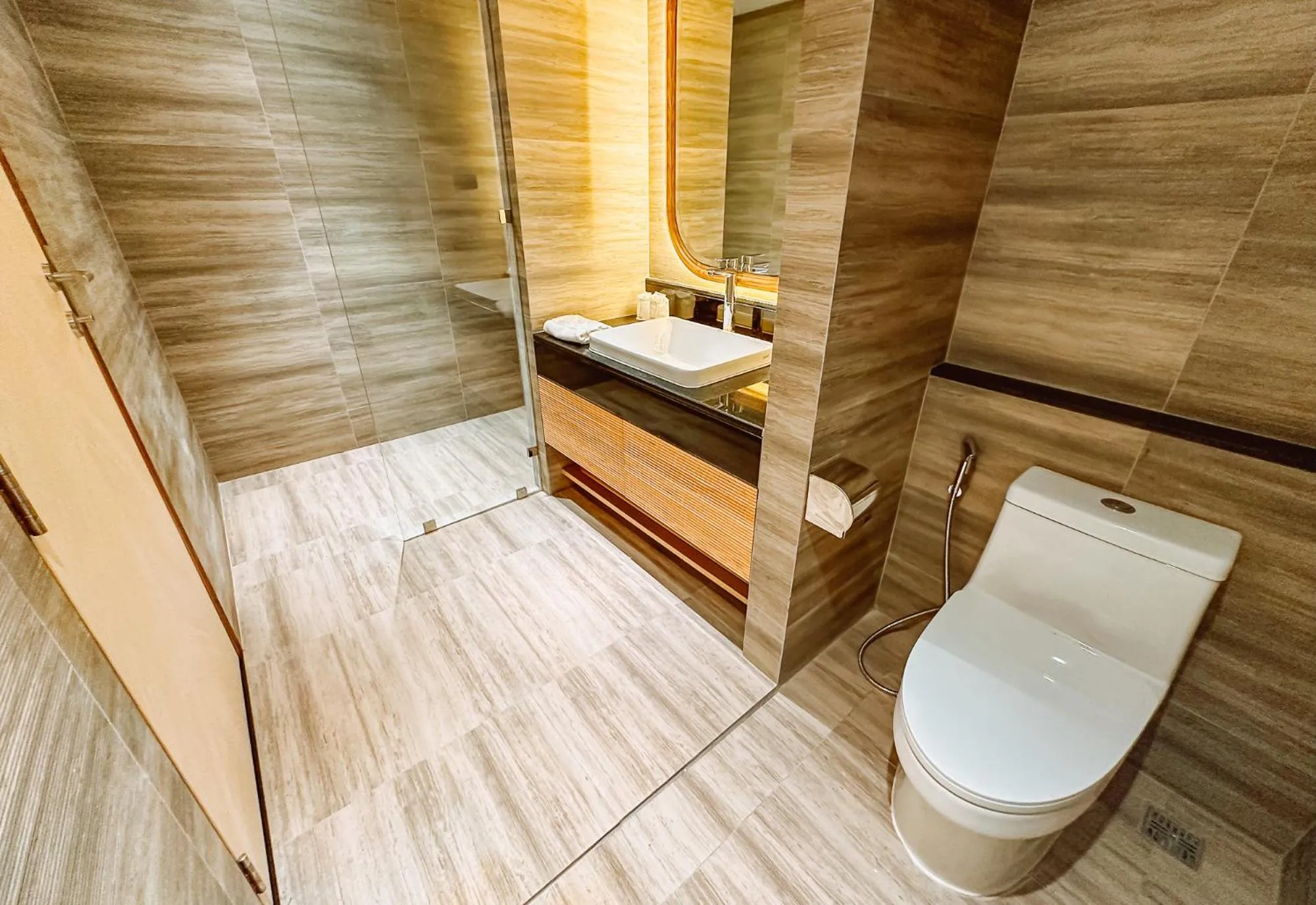 Toilet in Grand Lord Hotel & Residence - Khao chi chan Pattaya