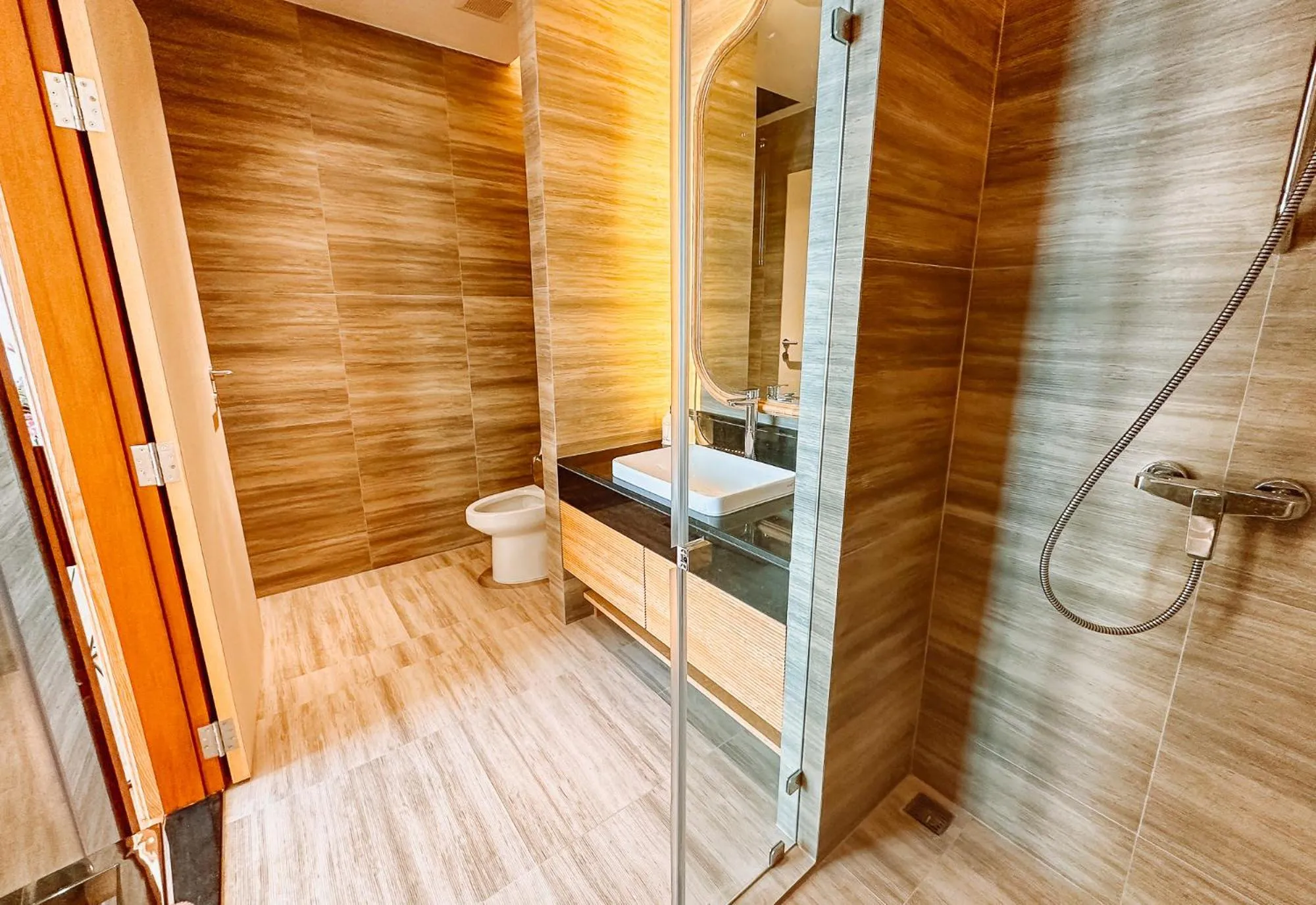 Toilet in Grand Lord Hotel & Residence - Khao chi chan Pattaya