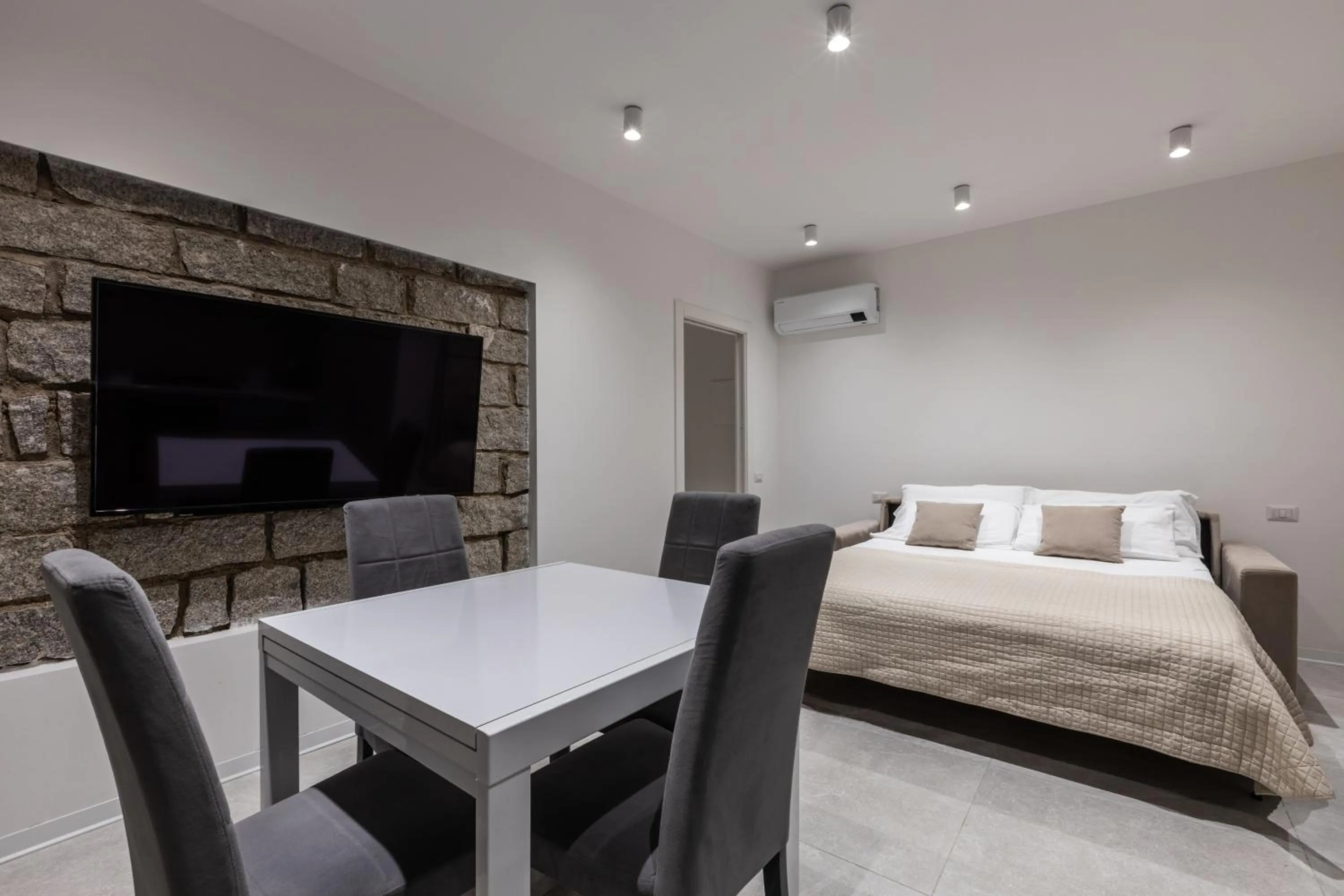 Living room, Bed in Baia del Sole Resort