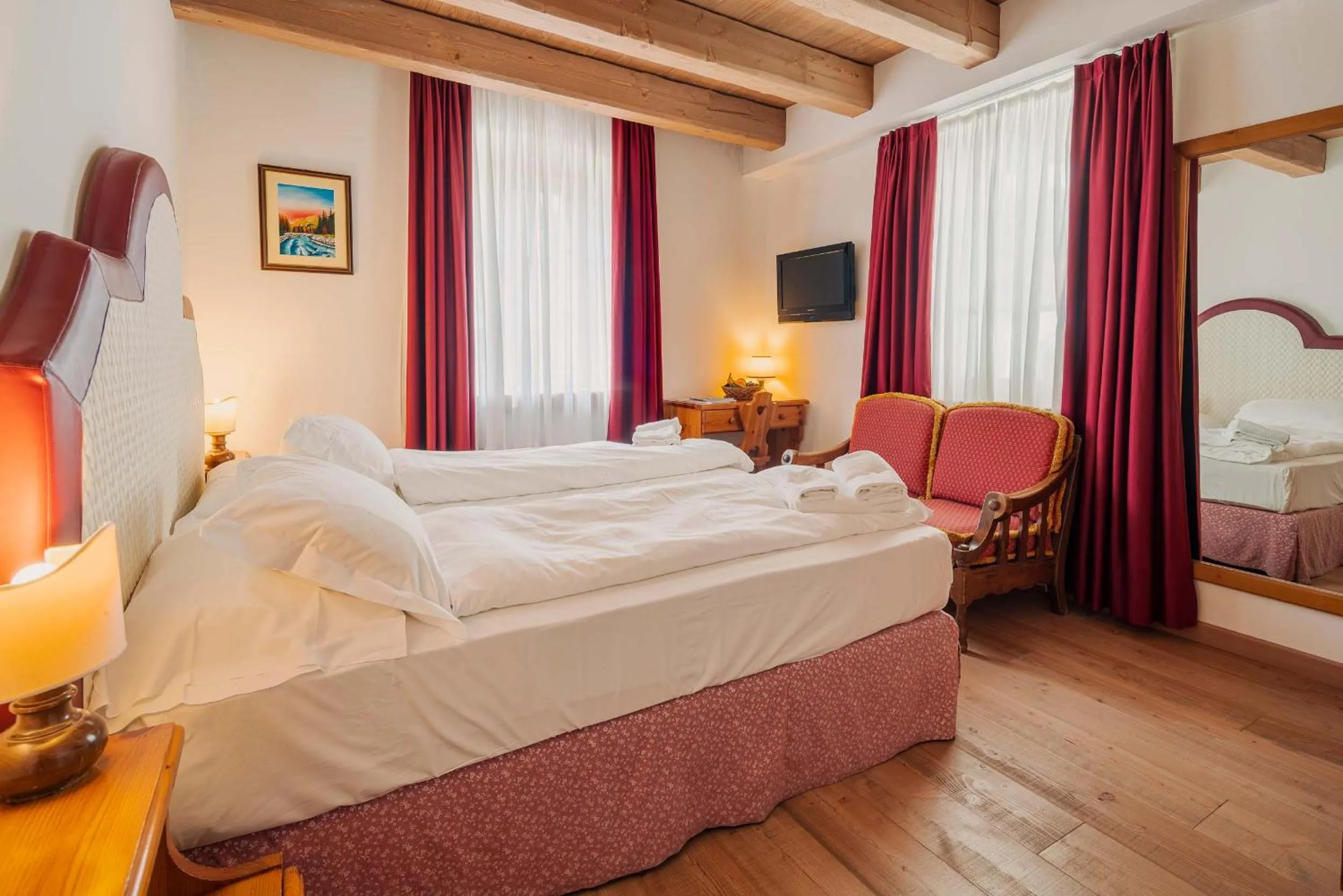 Bed in Royal Hotel Cortina