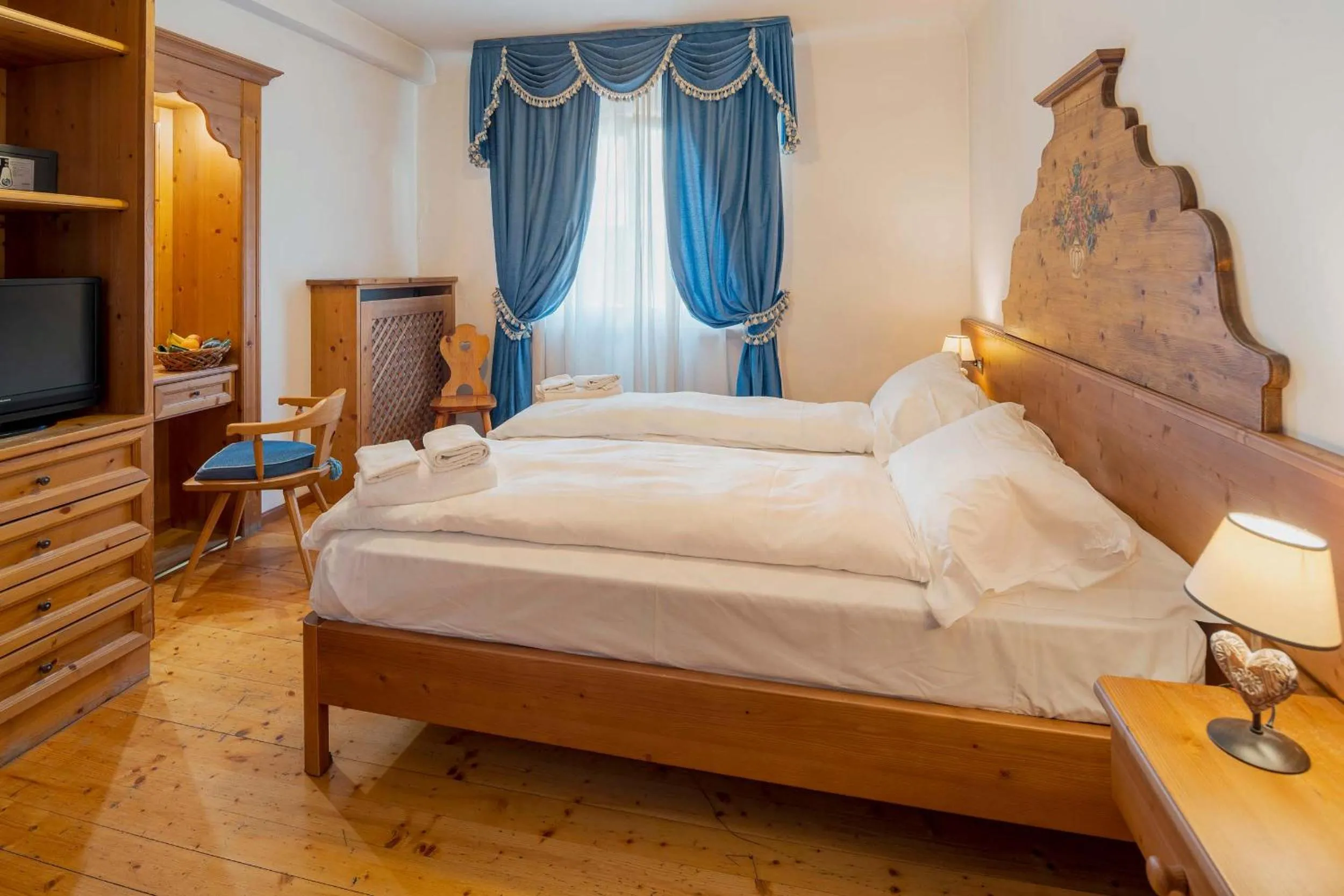 Bed in Royal Hotel Cortina