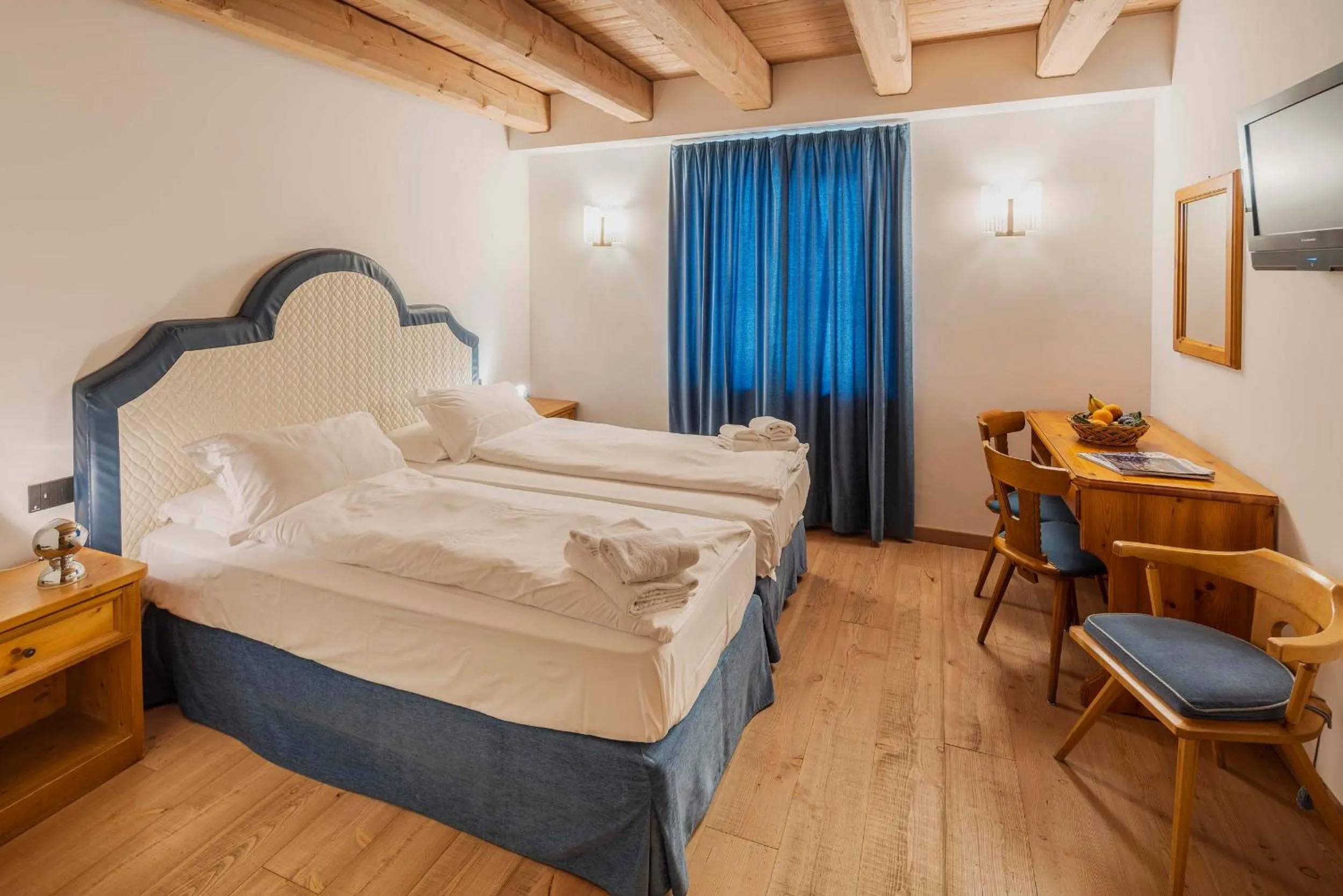 Bed in Royal Hotel Cortina