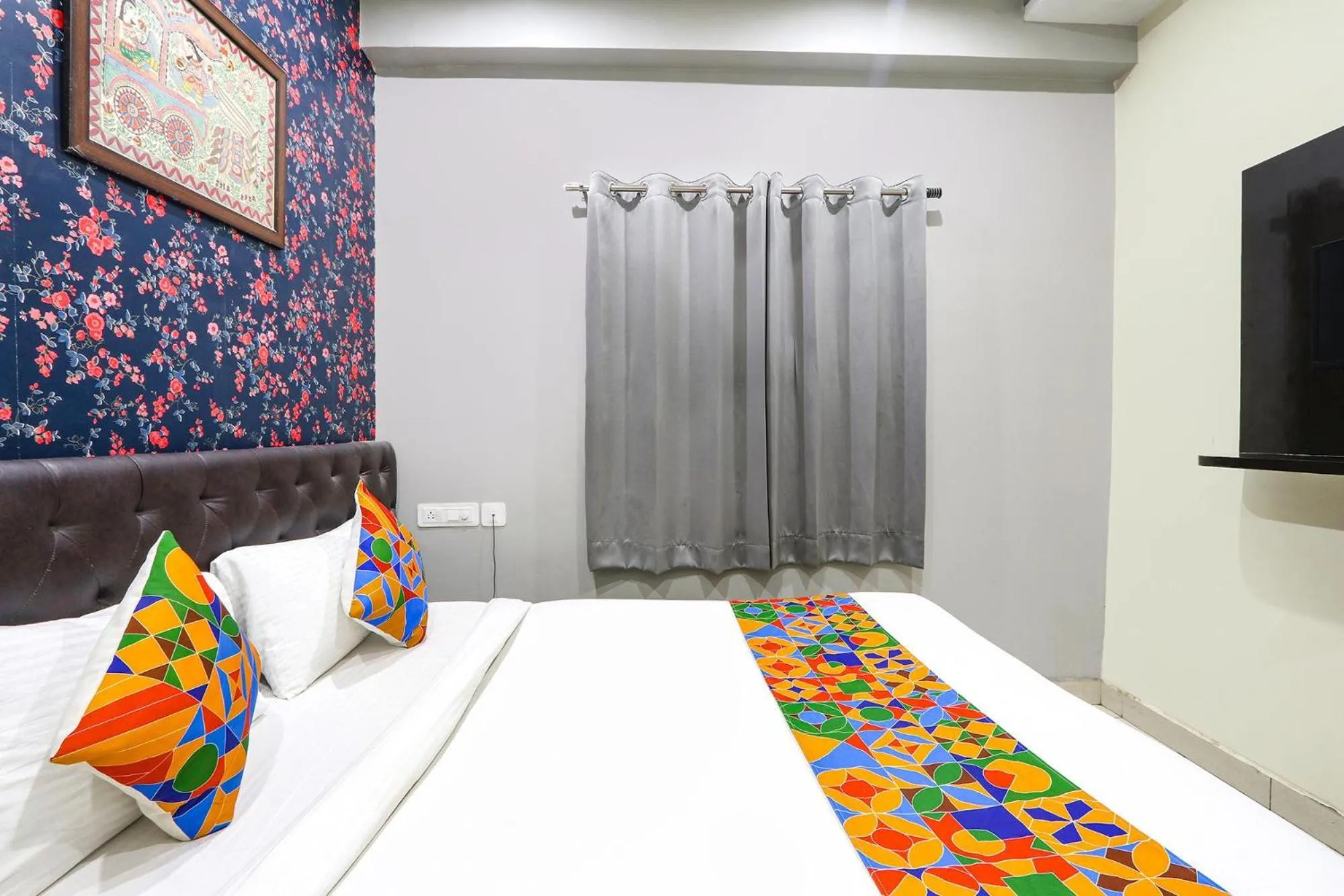 Bed in FabHotel Galaxy Suites