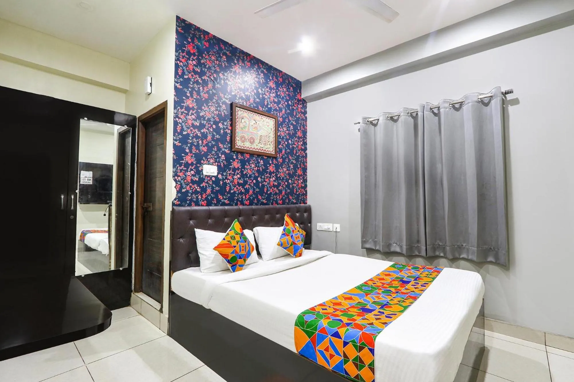 Bed in FabHotel Galaxy Suites