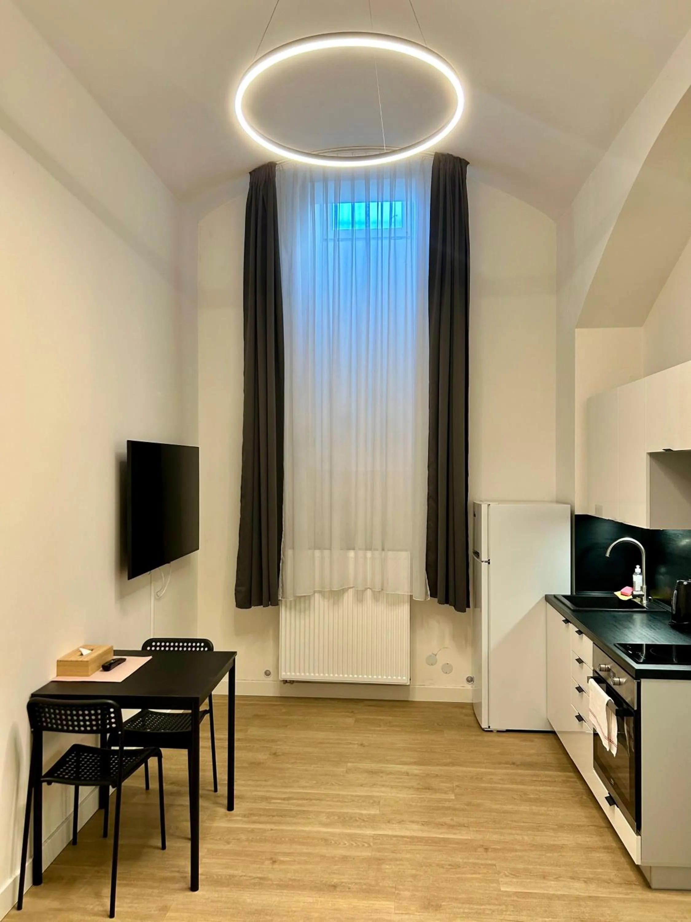 Bed in Figaro Suites