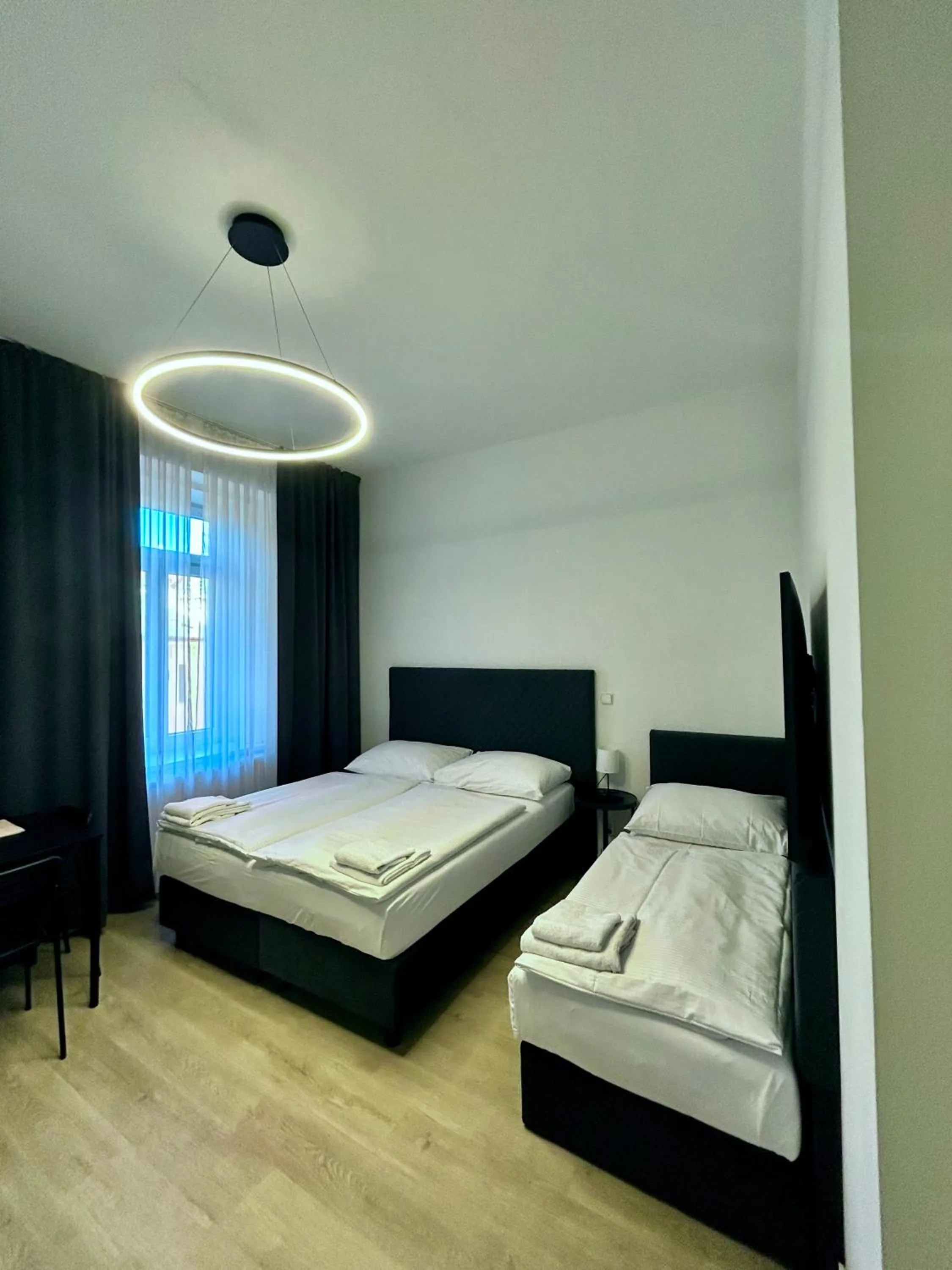 Bed in Figaro Suites