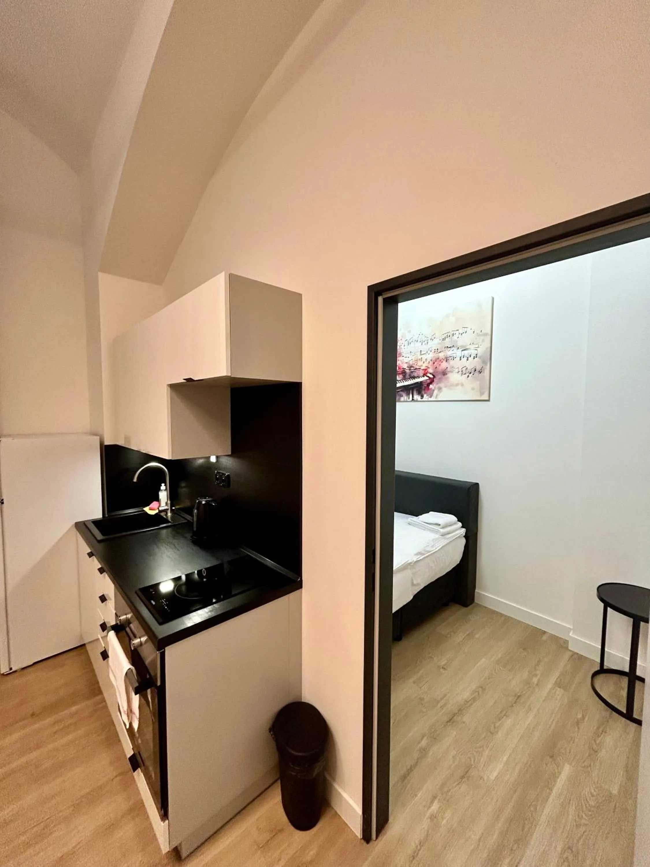 Bed in Figaro Suites