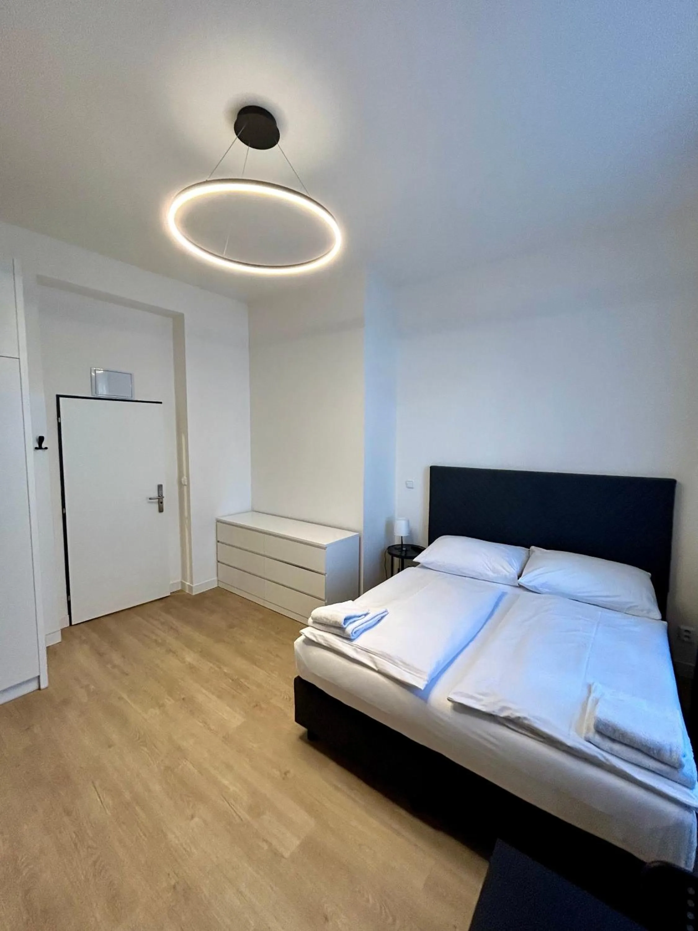 Bed in Figaro Suites