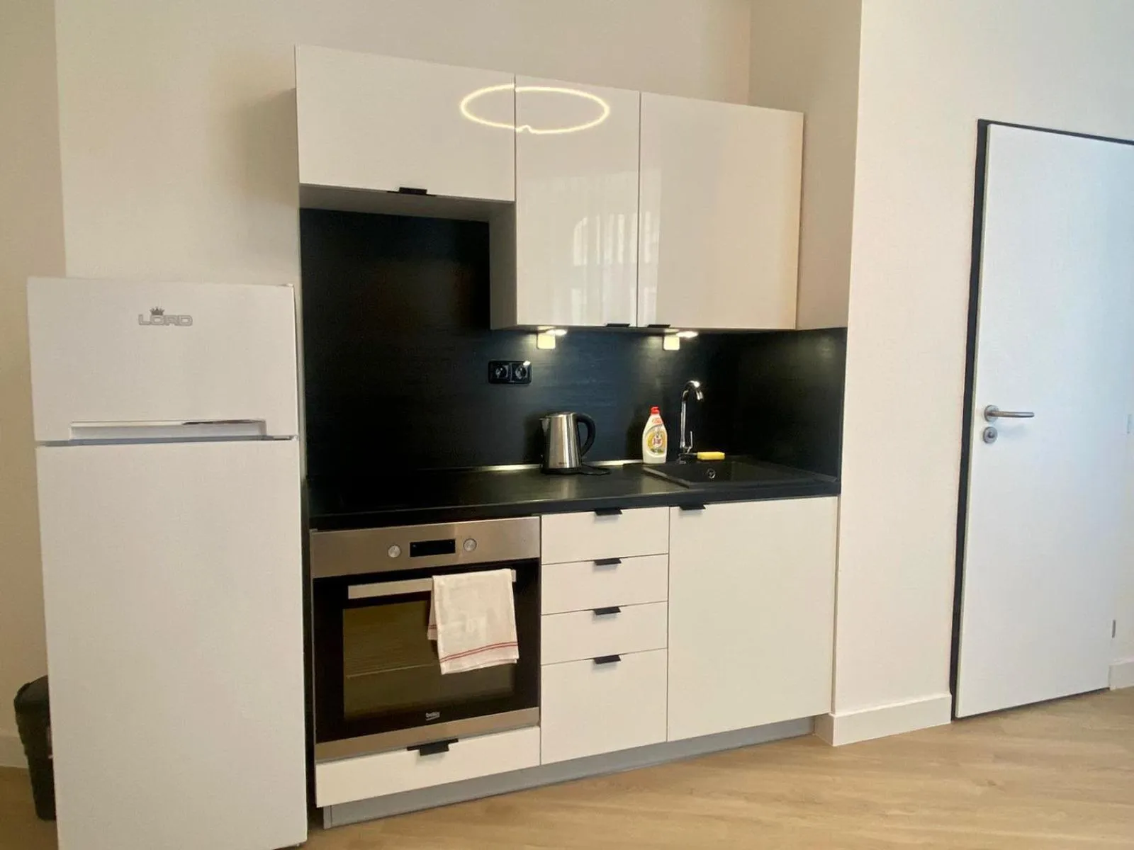 Kitchen or kitchenette in Figaro Suites