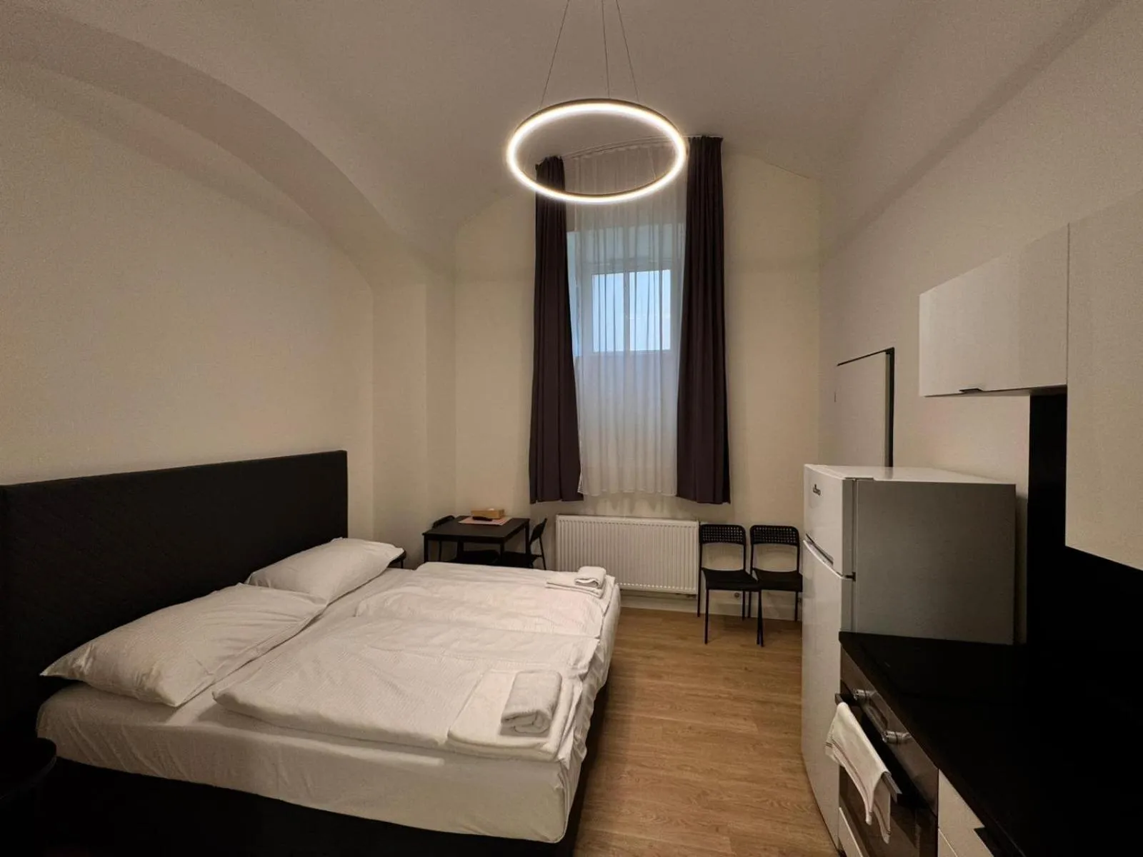 Bed in Figaro Suites