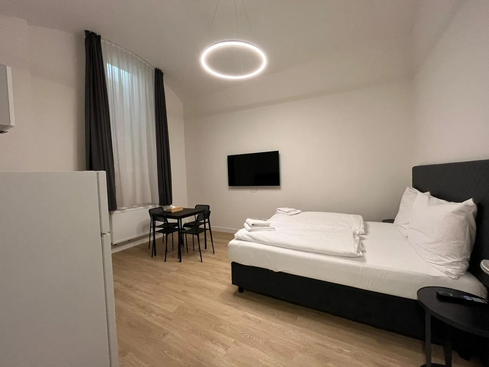 Bed in Figaro Suites