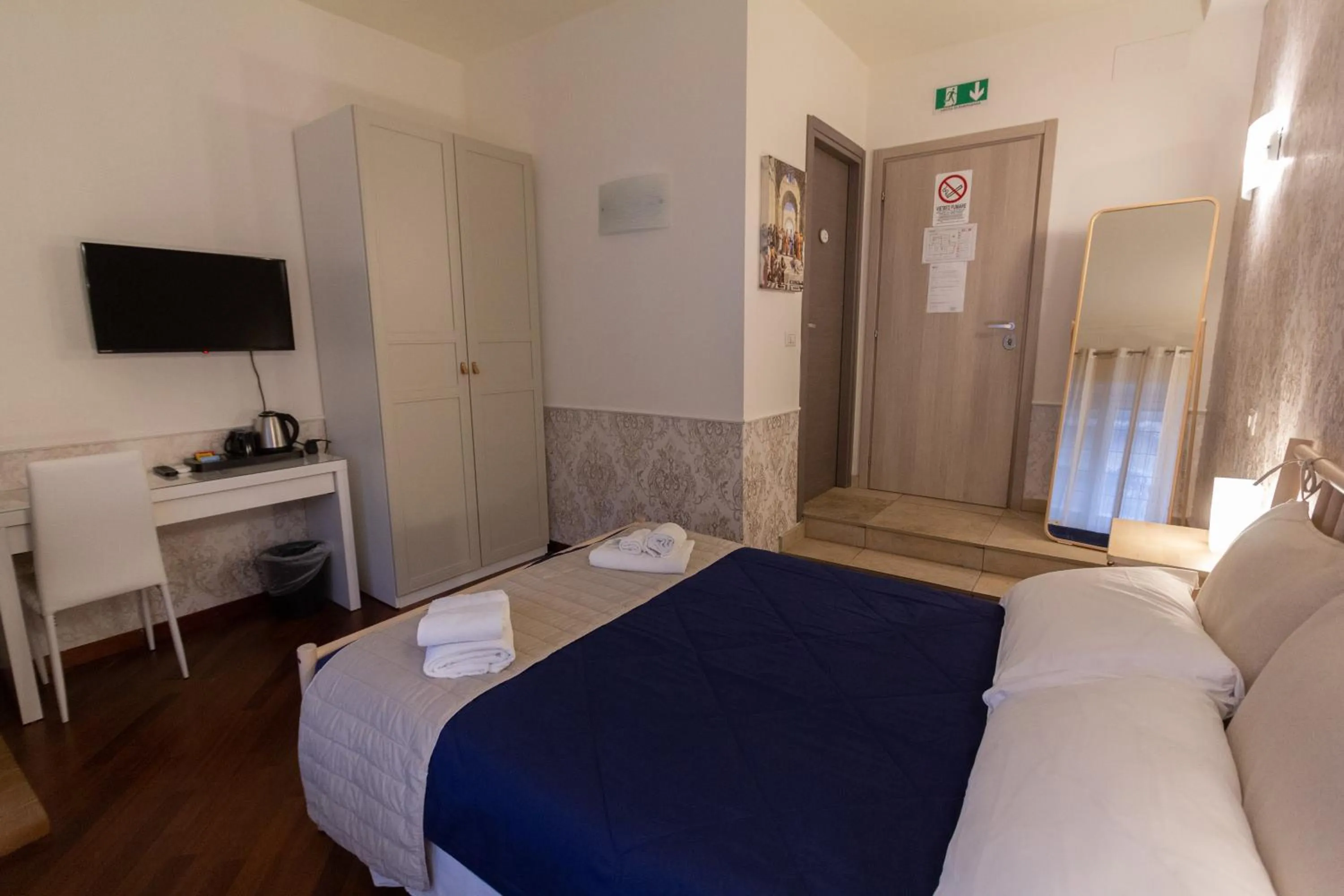 Bedroom, Bed in Aurelio Deluxe Rooms