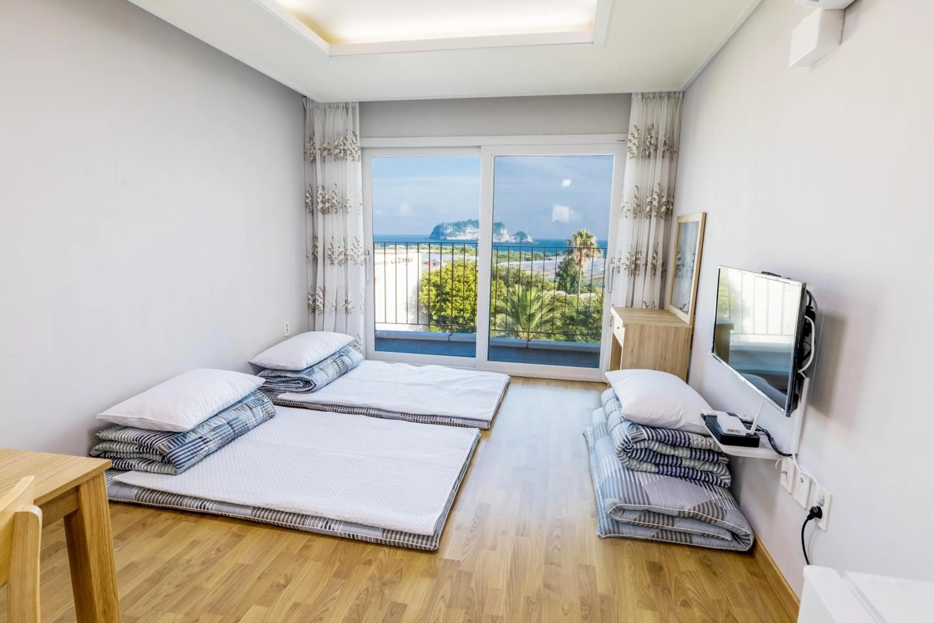 Bed in Jeju Bada Wi Olle Pension