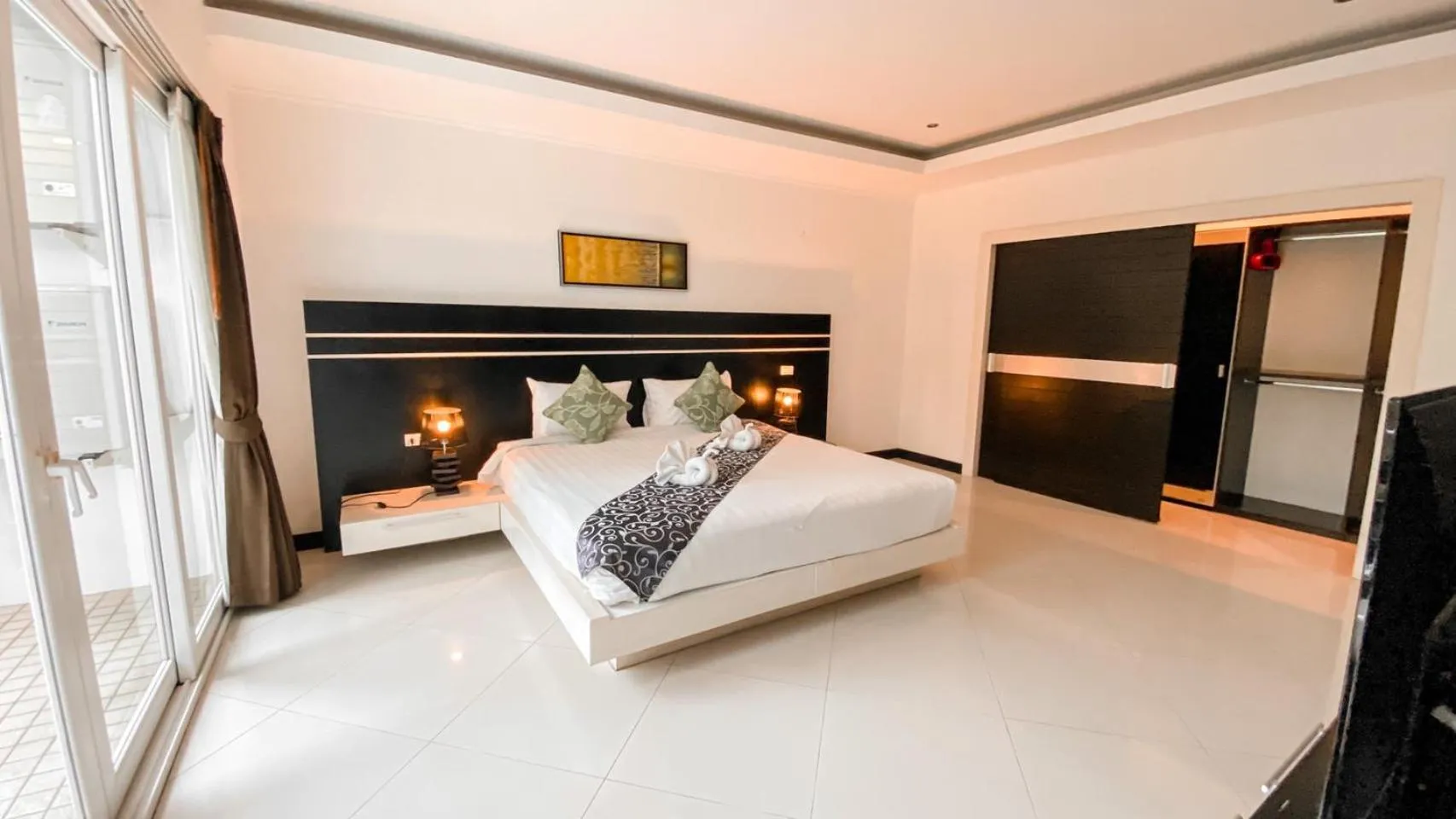 Bed in Hidden Palm Pool Villas