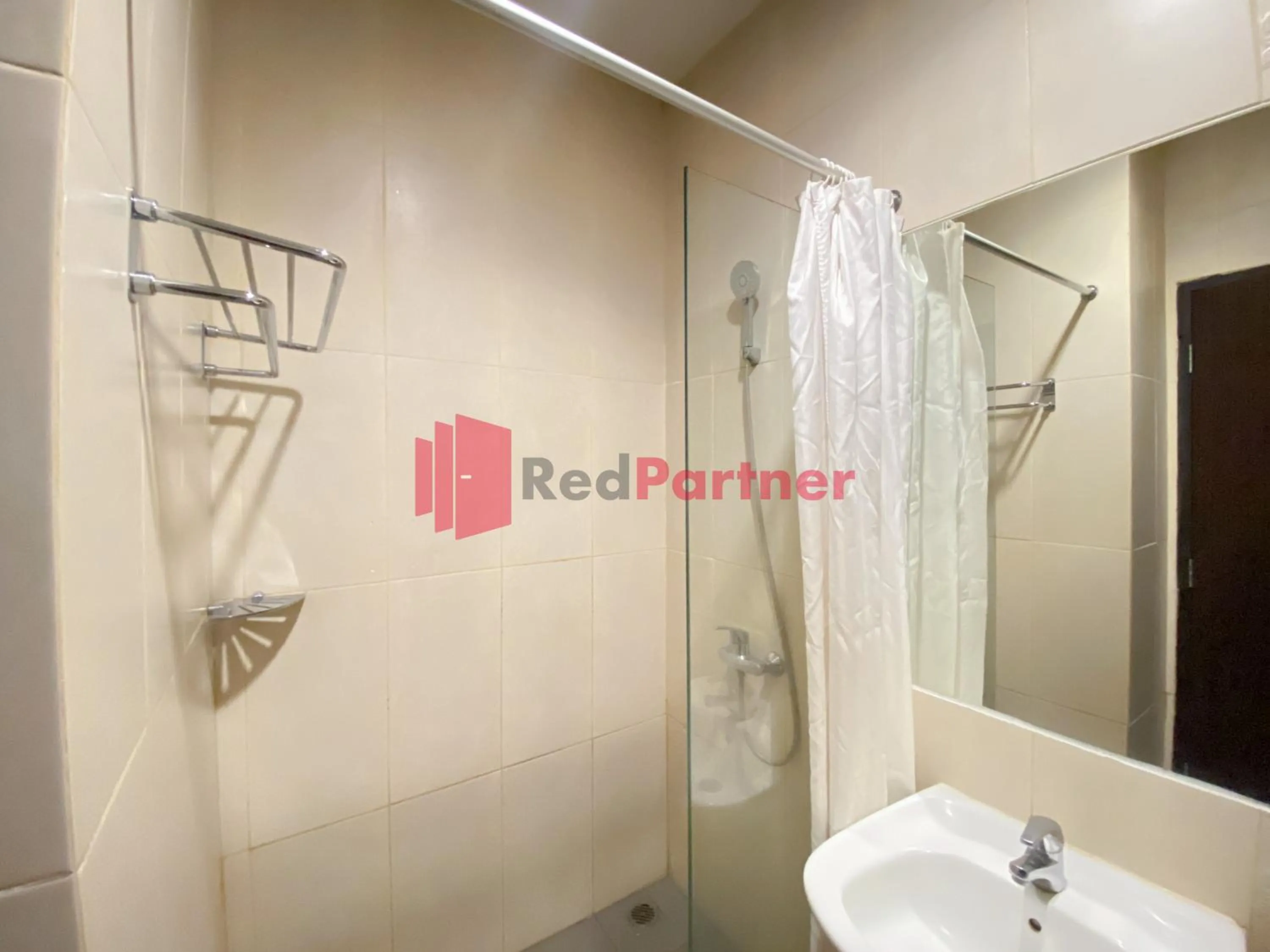 Bathroom in Hotel Alpha Makassar RedPartner