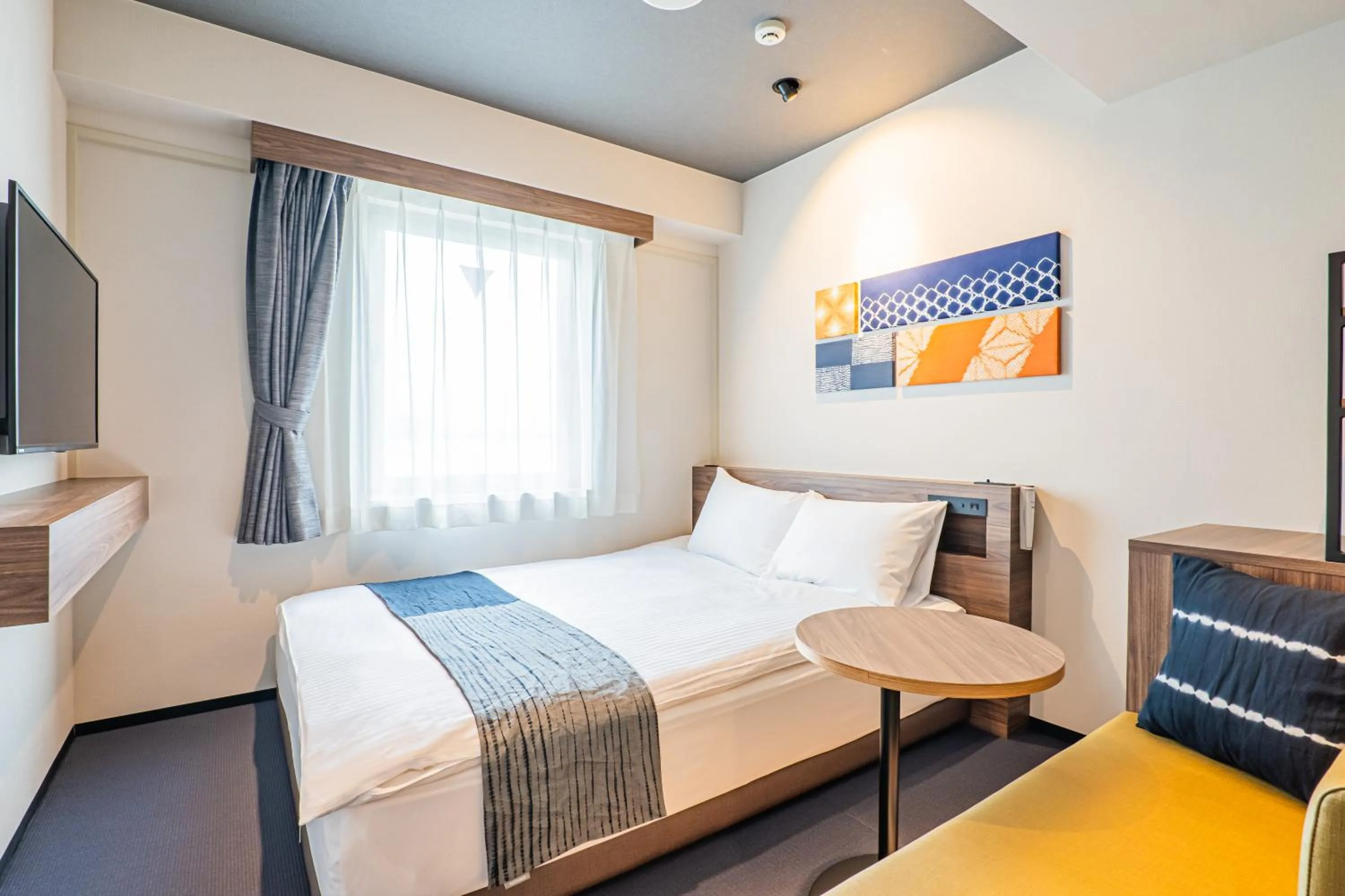 Bed in -SPA RESORT- Nagoya Kasadera Hotel