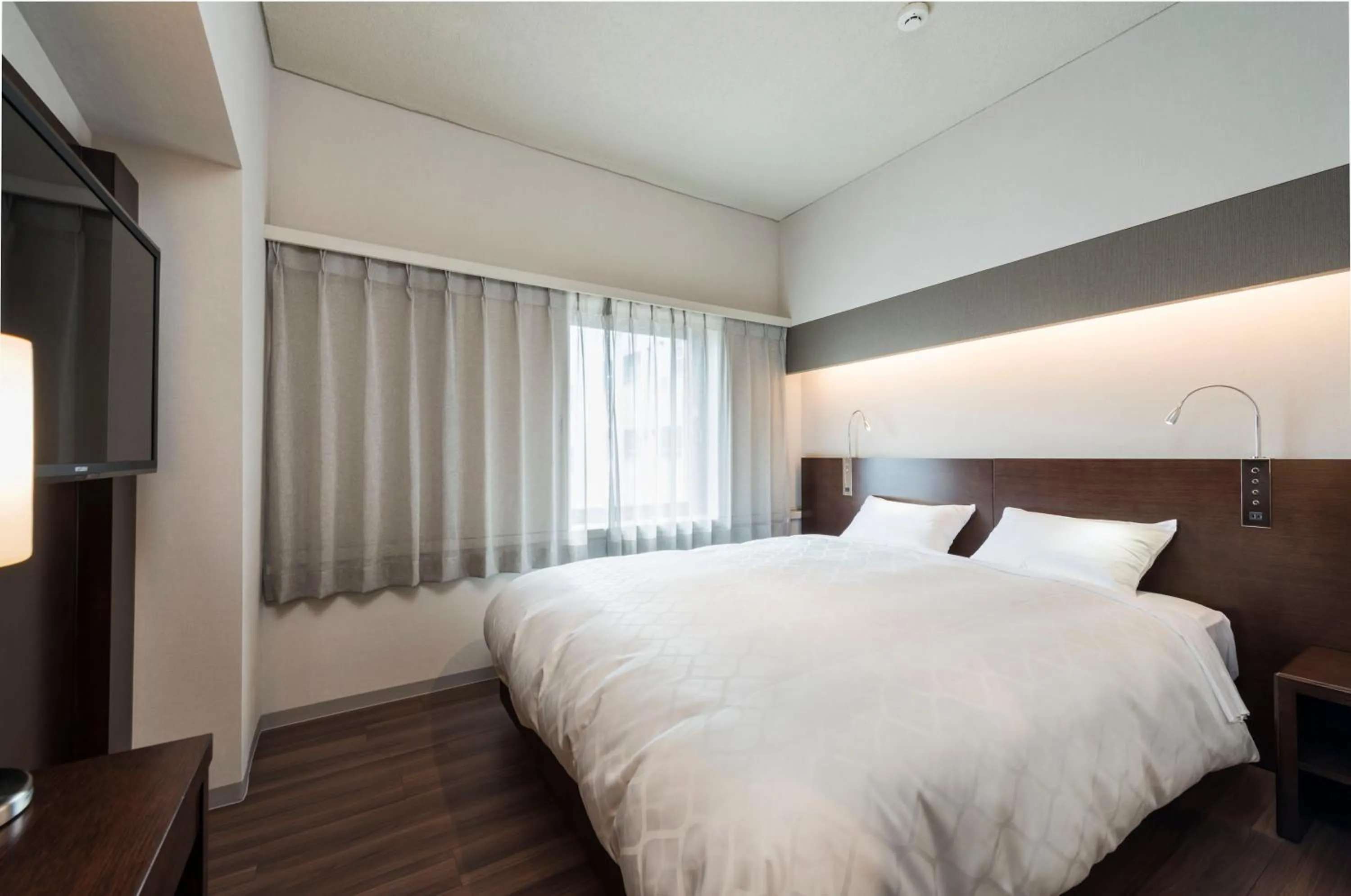 Bed in Nagoya Kanayama Hotel