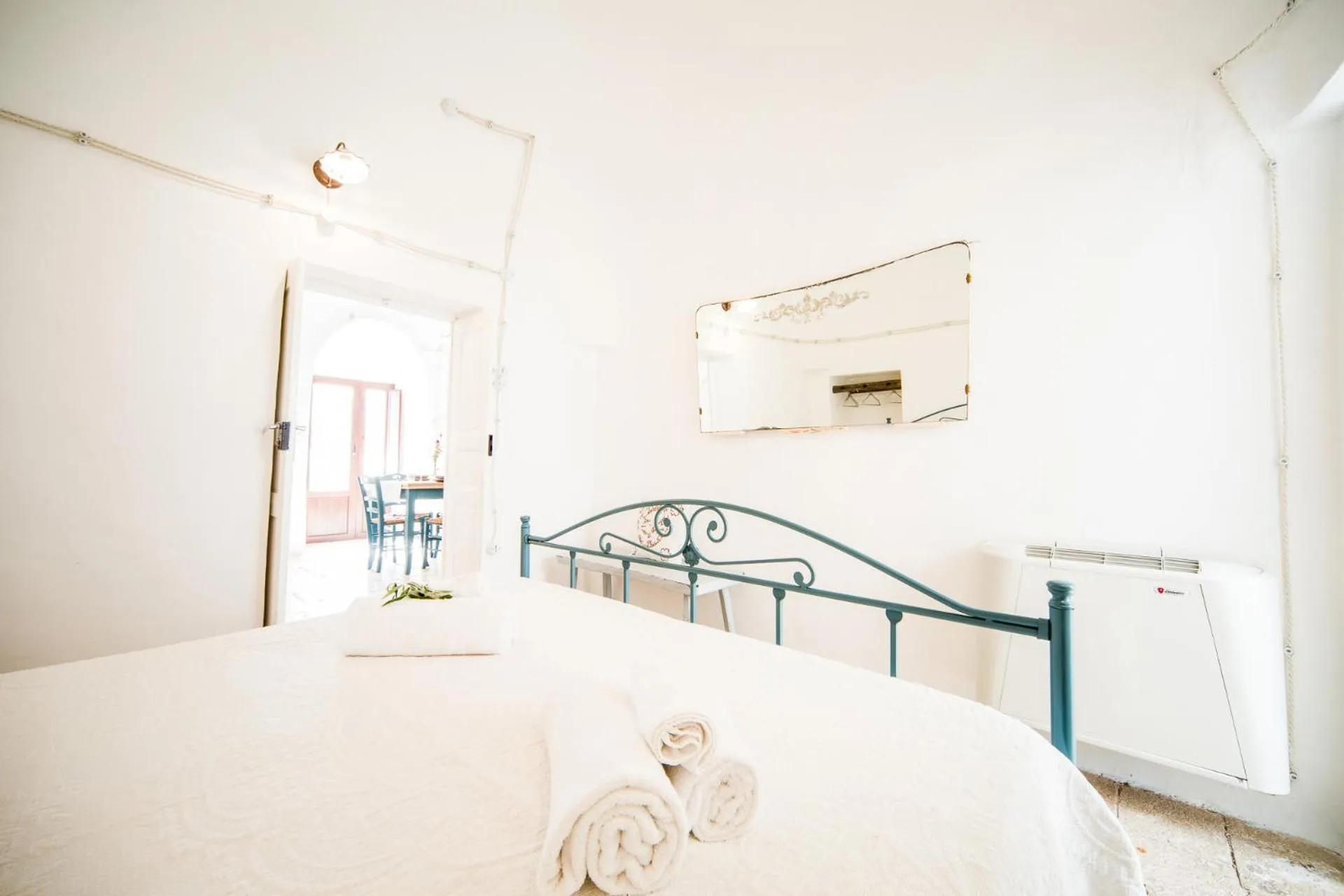 Bed in Trulli Nuova Aia Resort