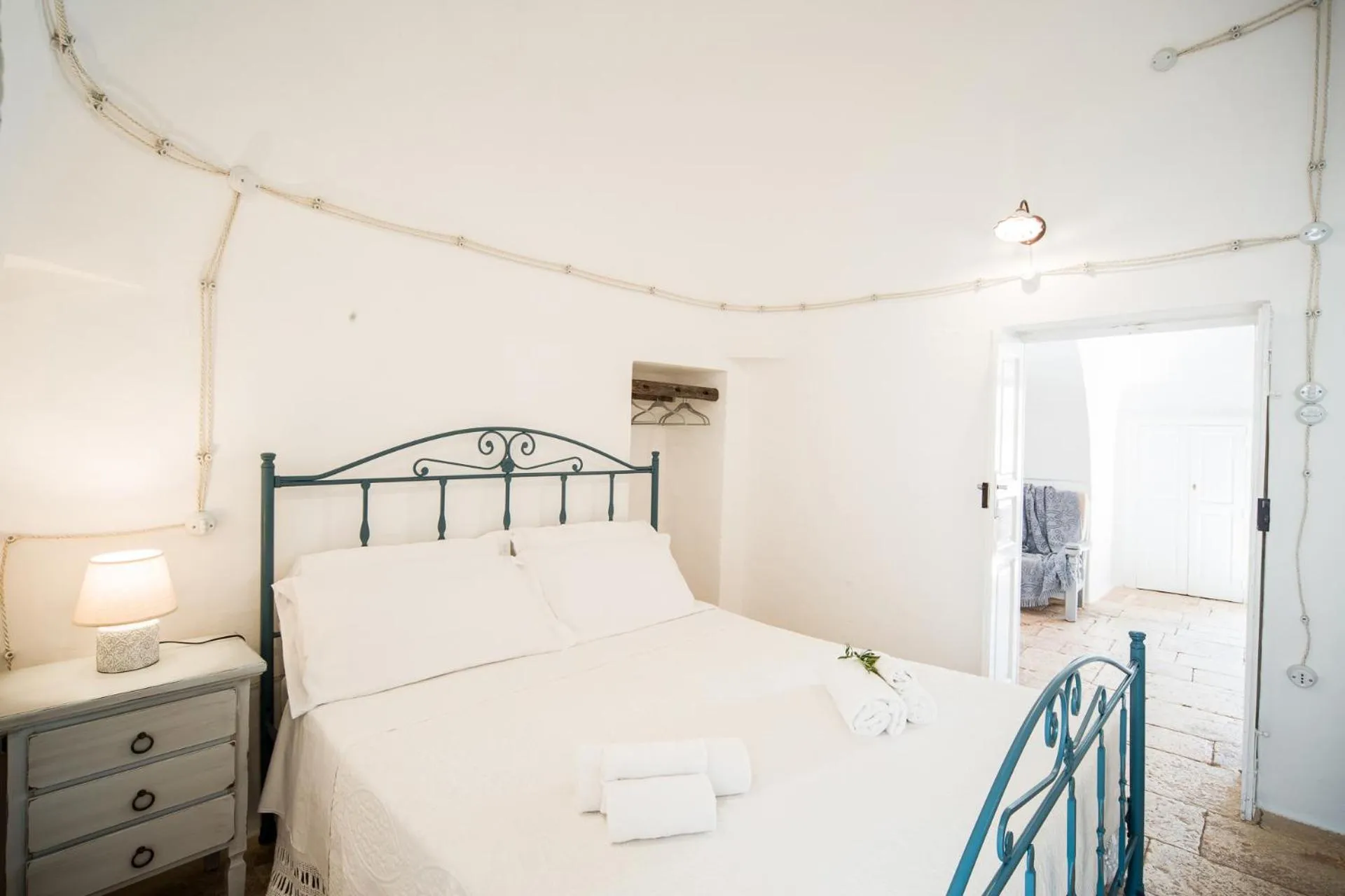 Bed in Trulli Nuova Aia Resort