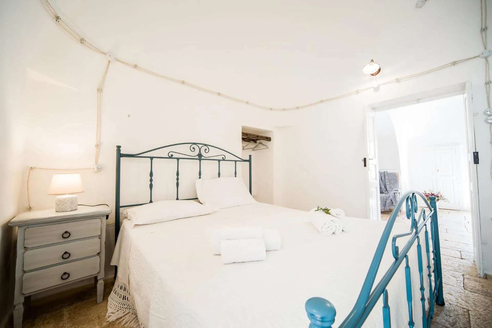 Bed in Trulli Nuova Aia Resort