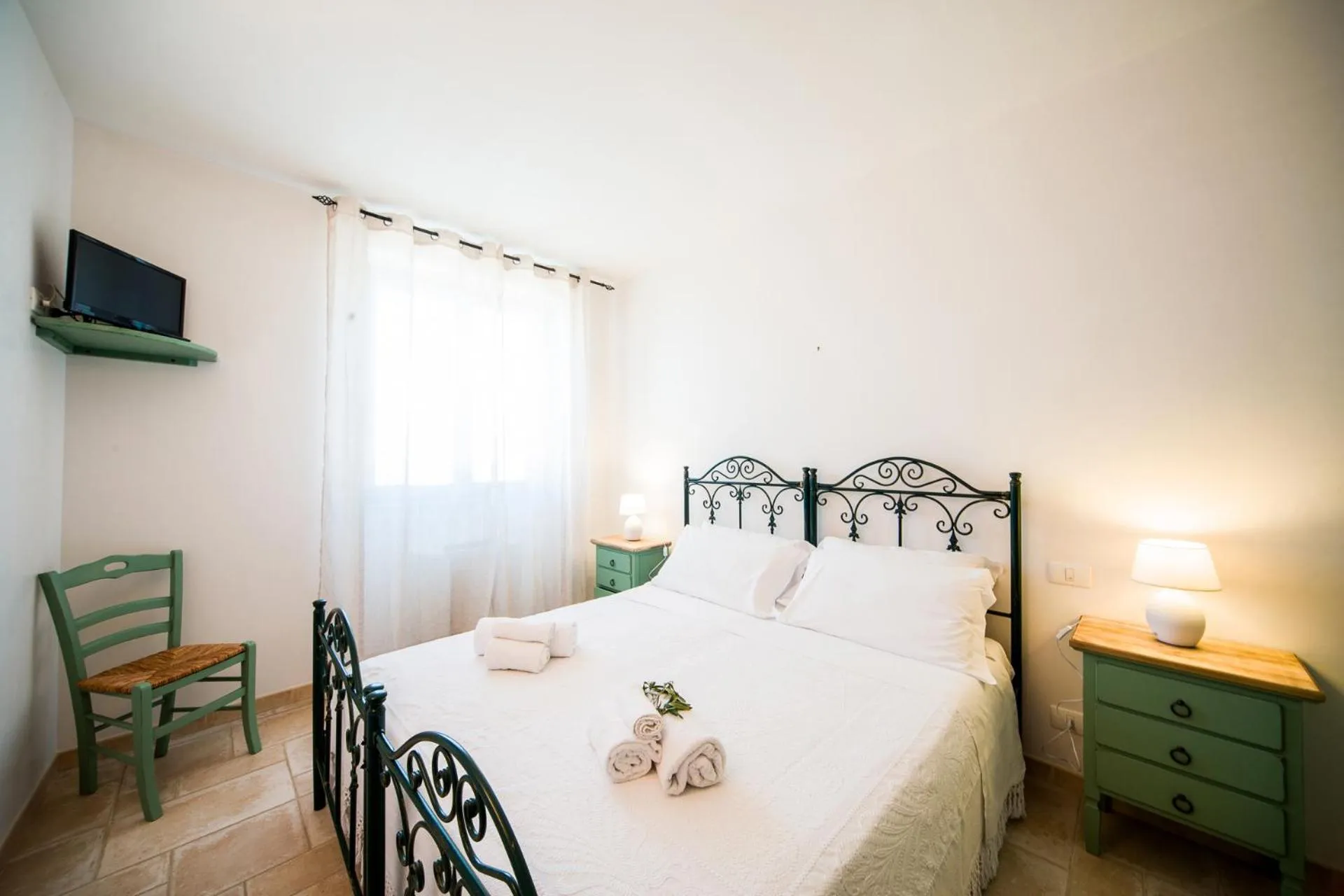 Bed in Trulli Nuova Aia Resort