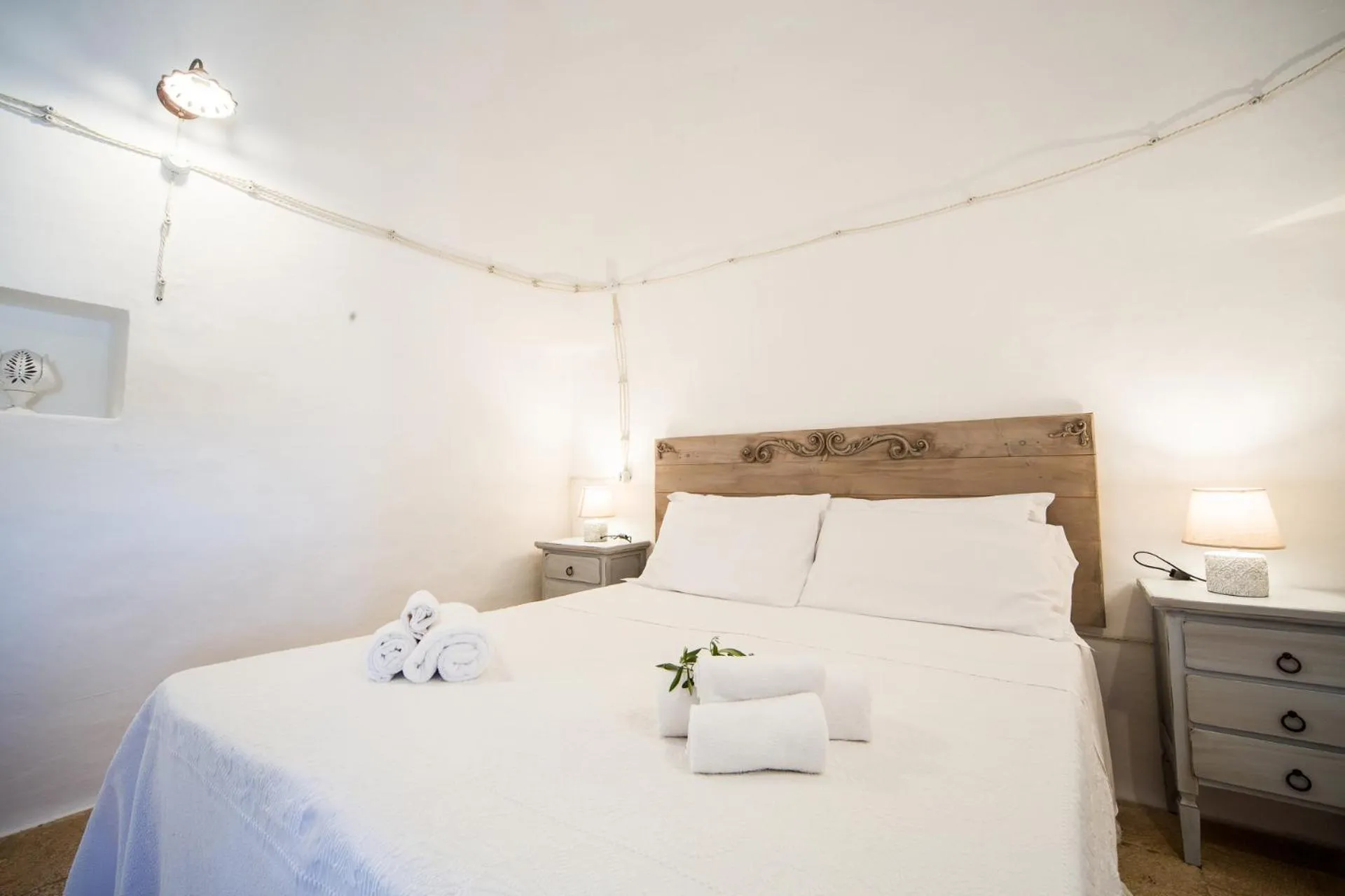 Bed in Trulli Nuova Aia Resort