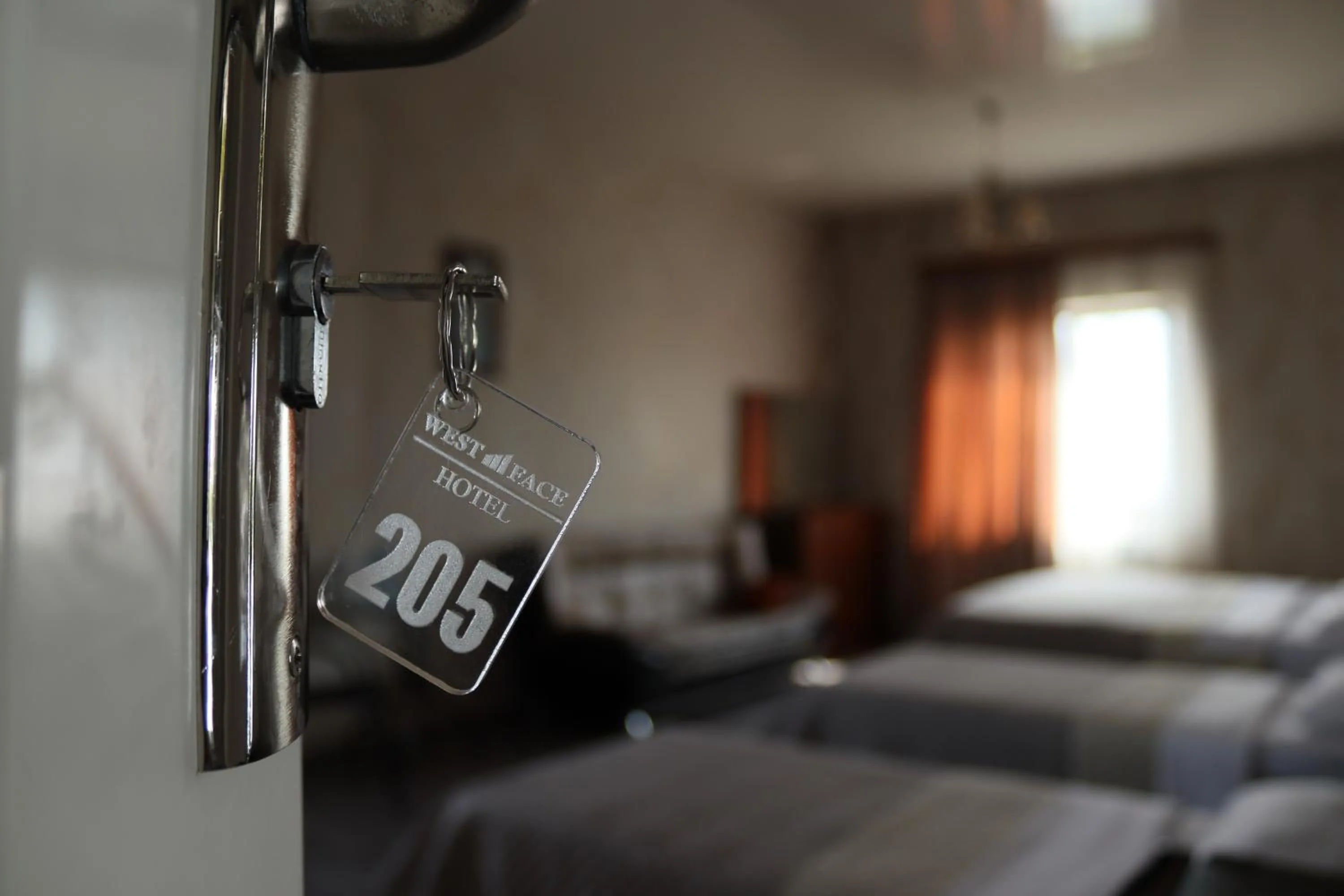 Property logo or sign in Hotel West Face