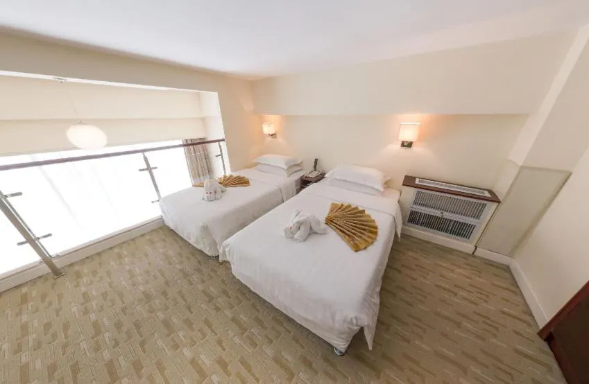 Bed in Fulitai International Hotel