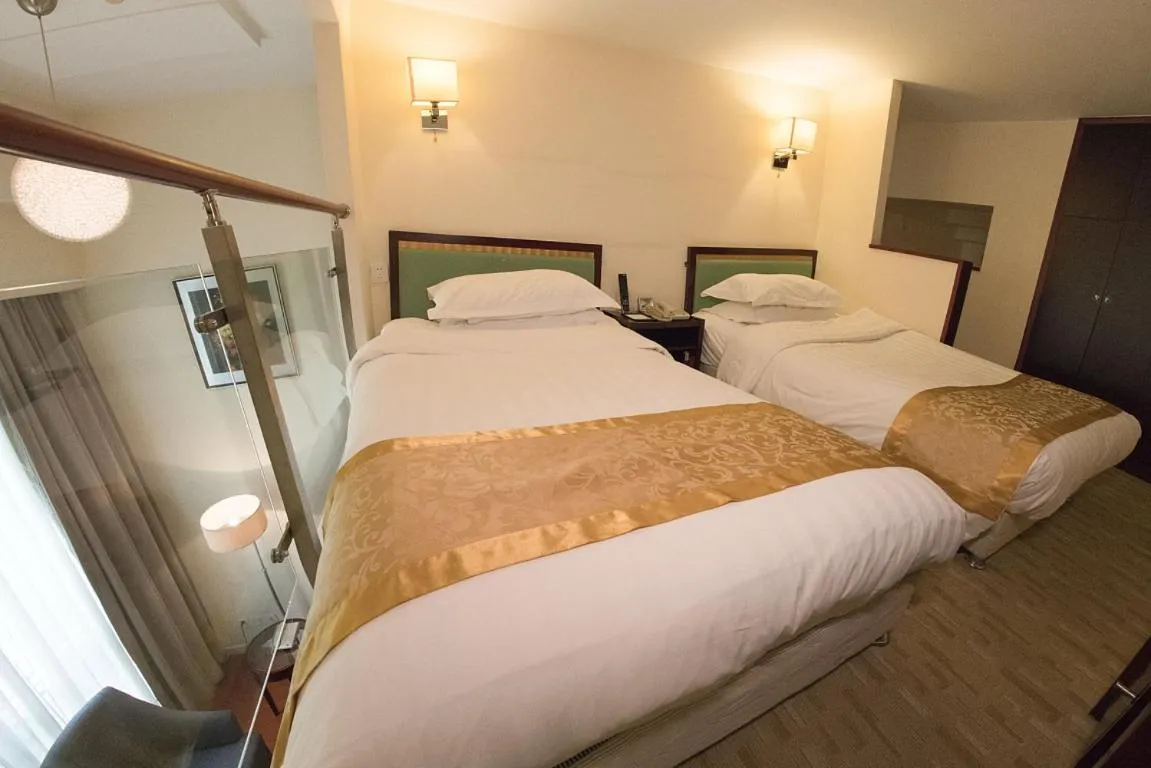 Bed in Fulitai International Hotel