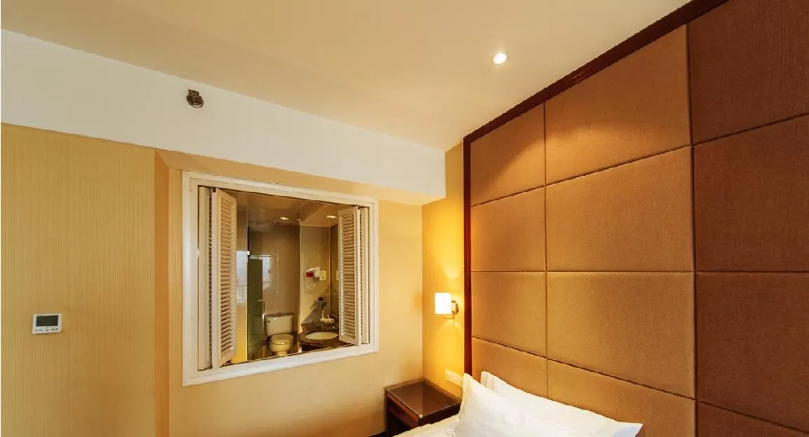 Bed in Fulitai International Hotel