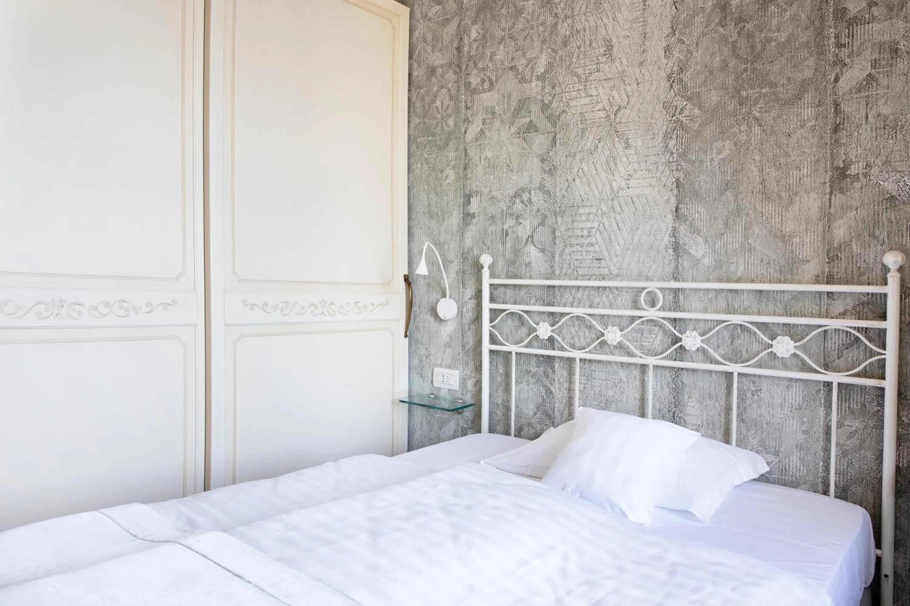 Bed in Relais Villa Porta