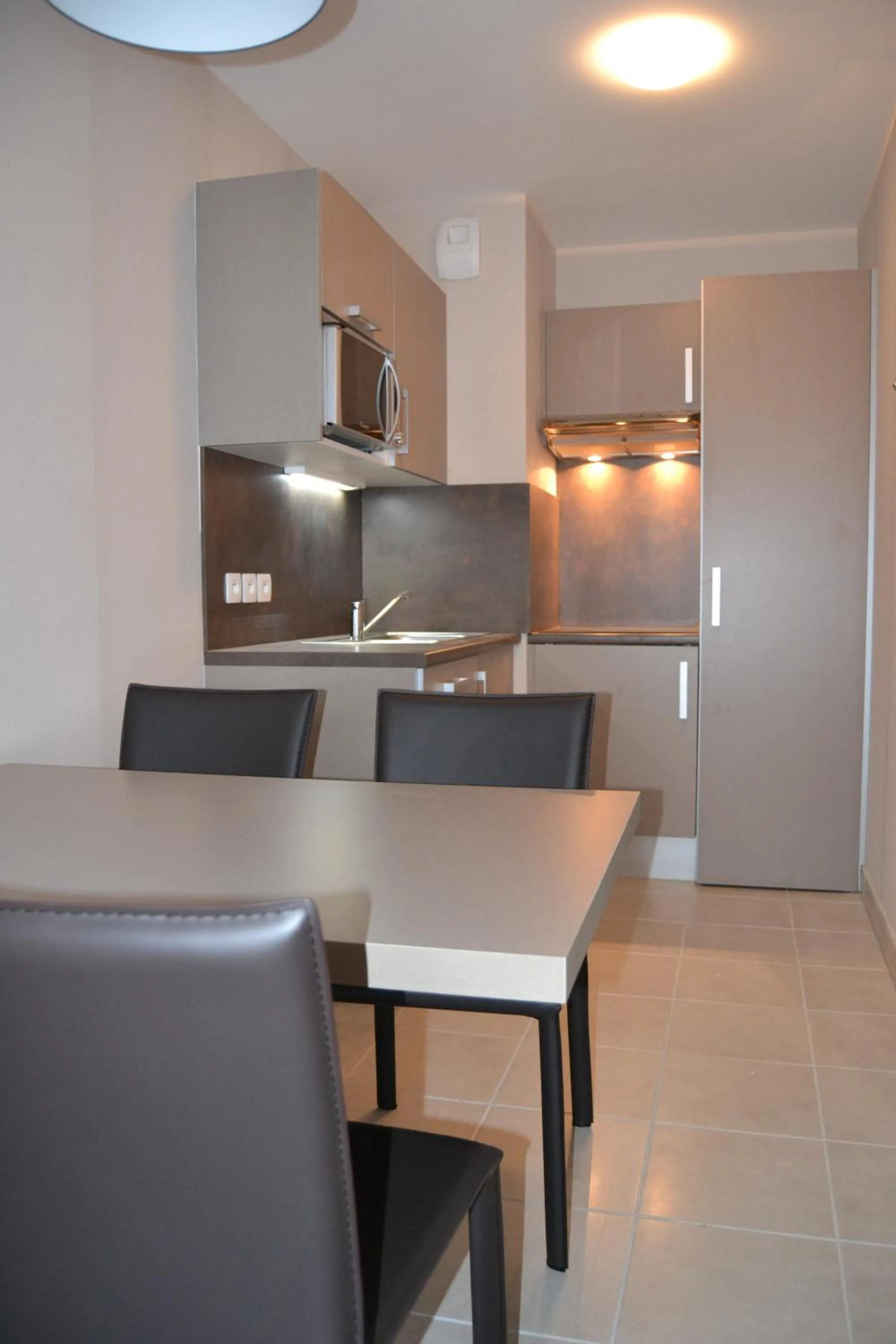 Kitchen or kitchenette in Residence Thalasso Concarneau