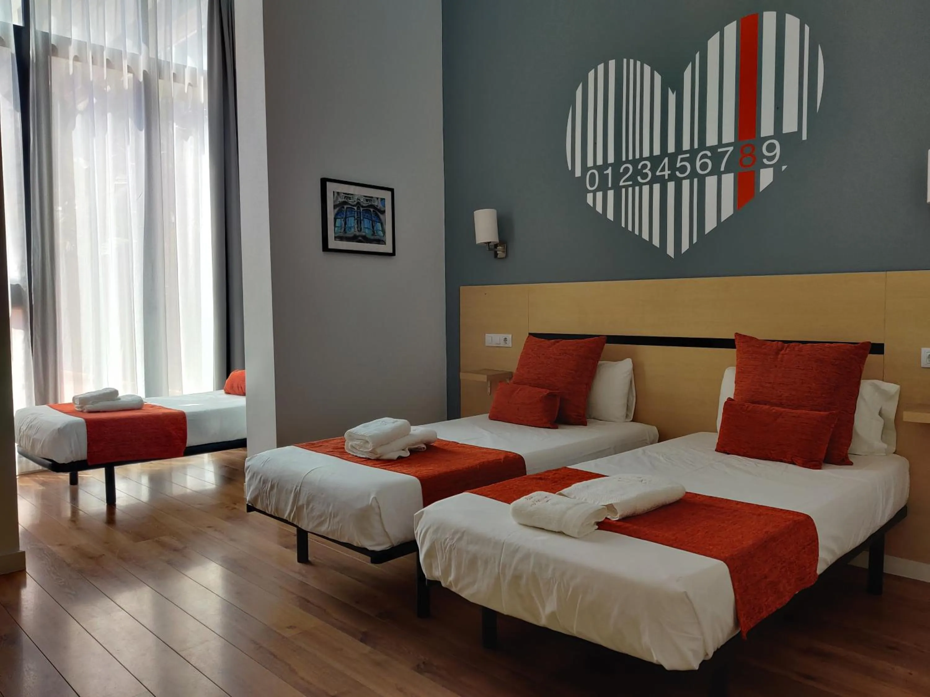 Bed in Hostal Live Natura Barcelona