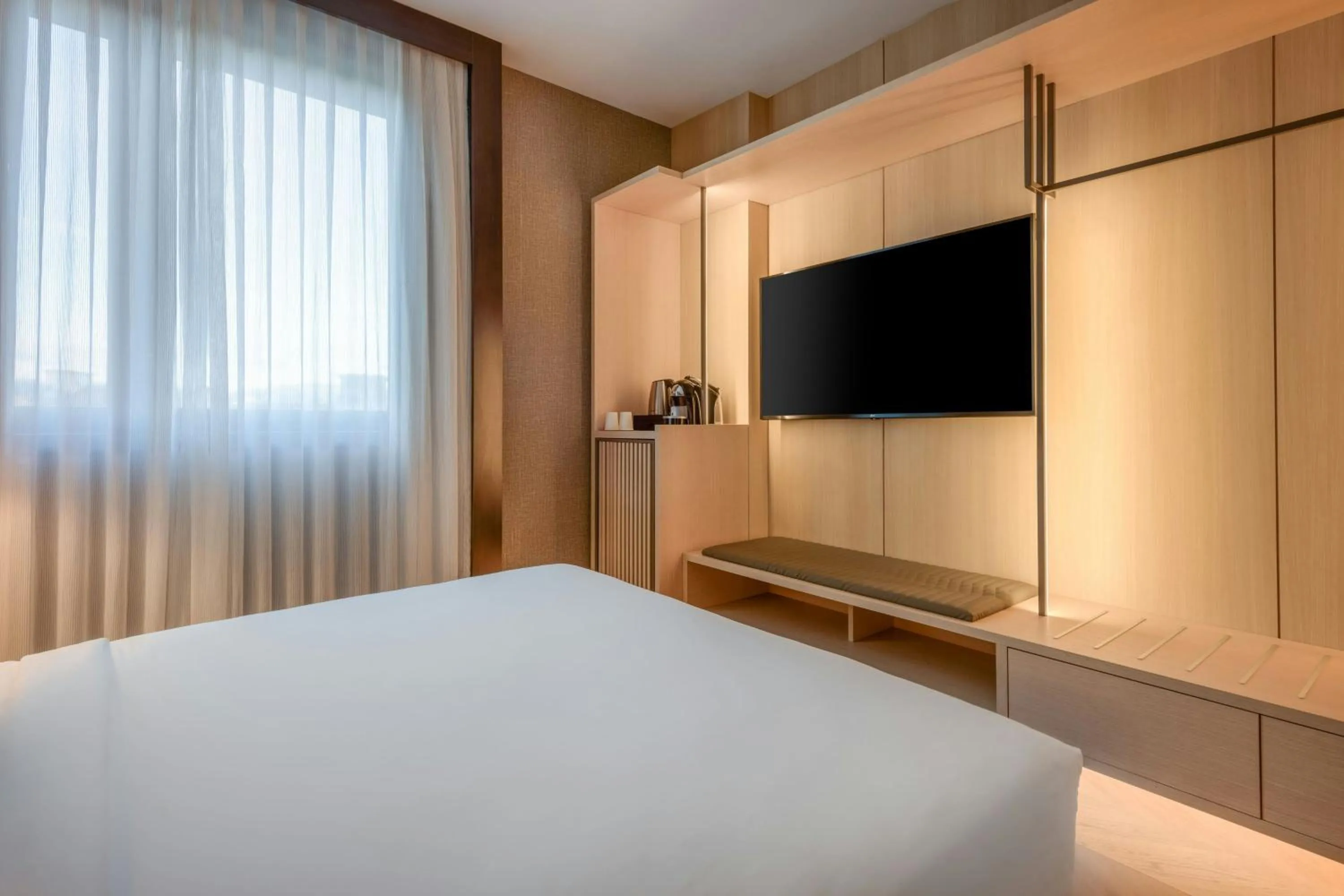 Photo of the whole room, Bed in AC Hotel Firenze by Marriott