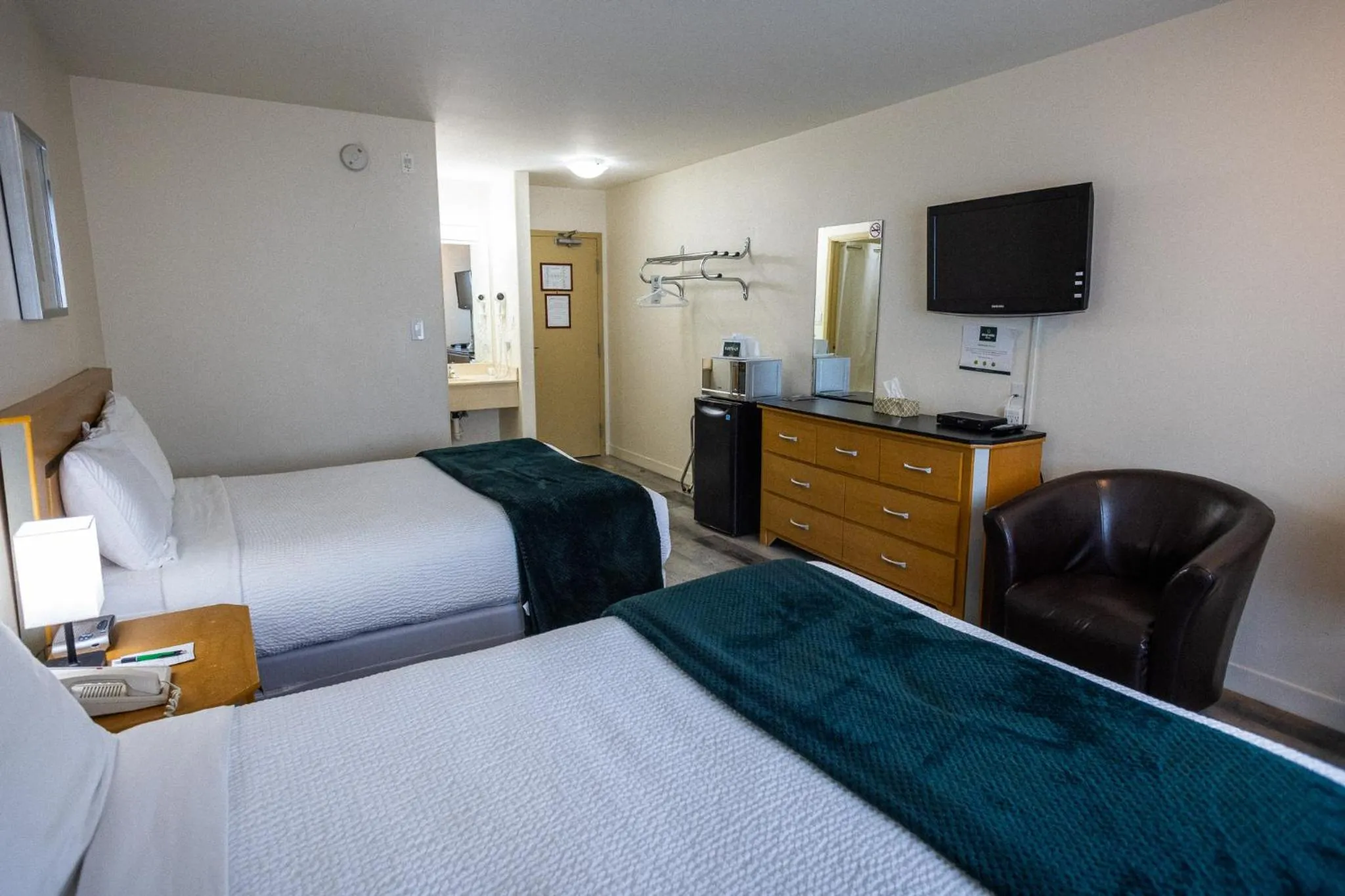 Bed in Sleep Suite Motel