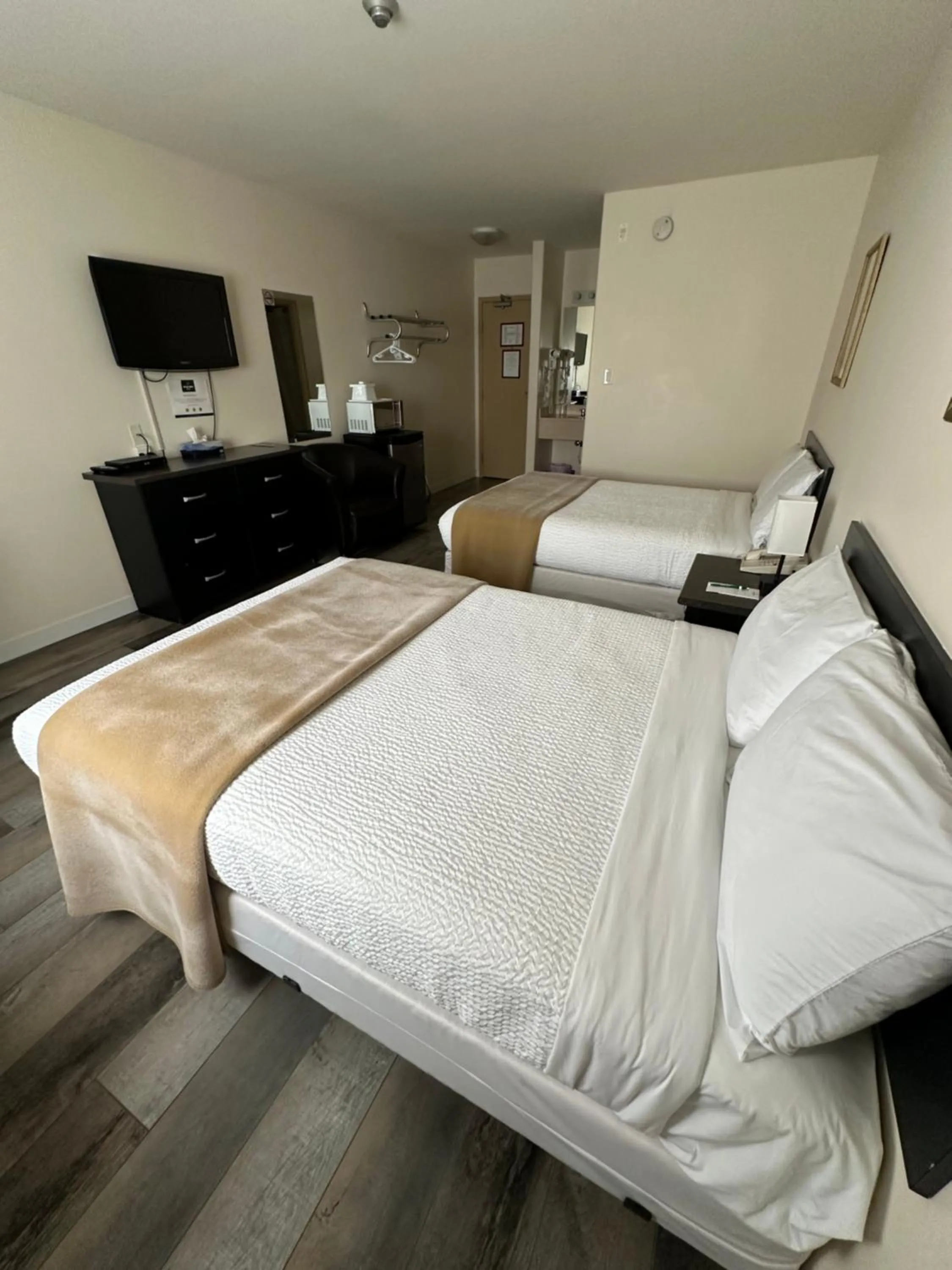 Bed in Sleep Suite Motel