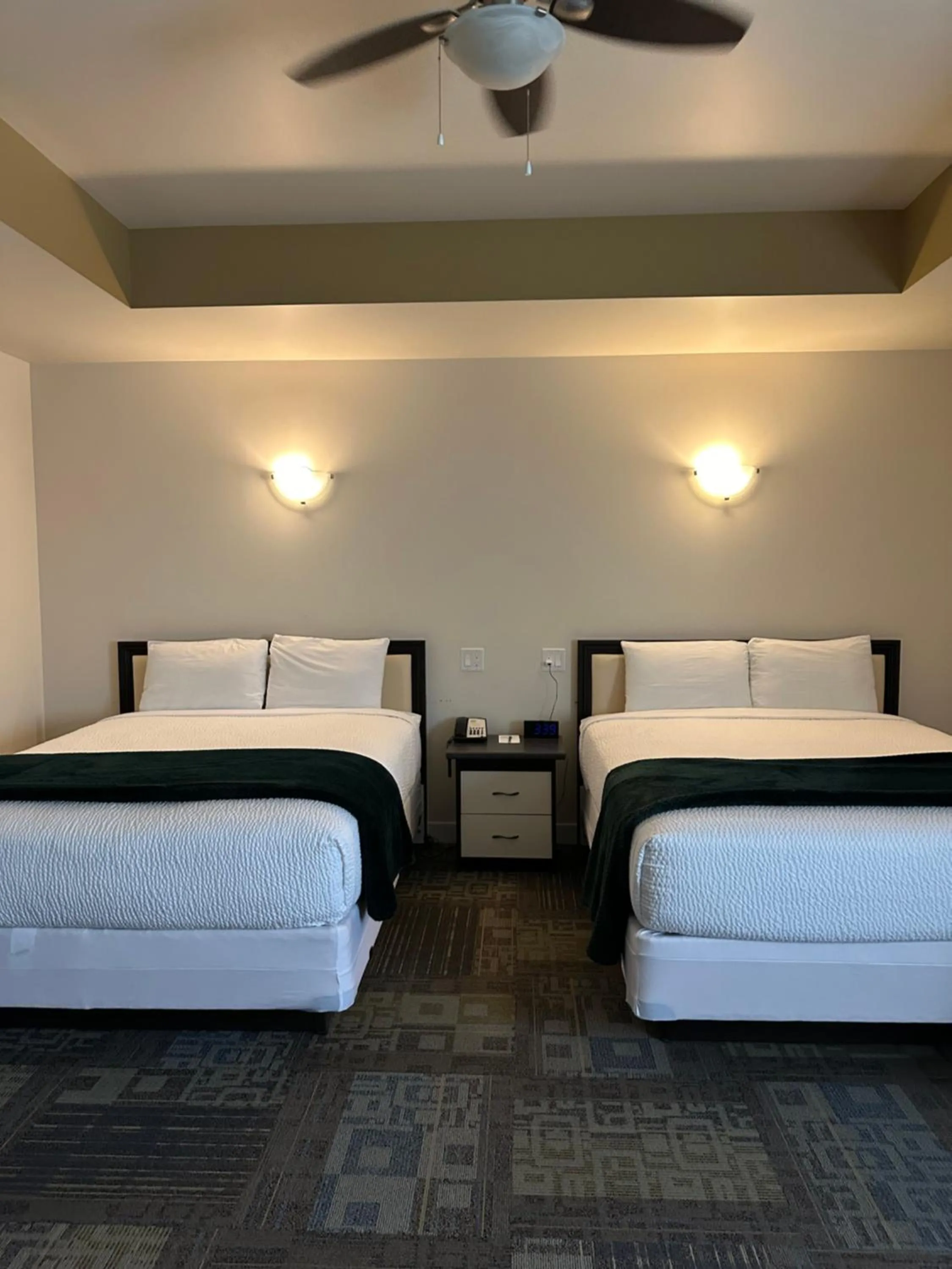 Bed in Sleep Suite Motel