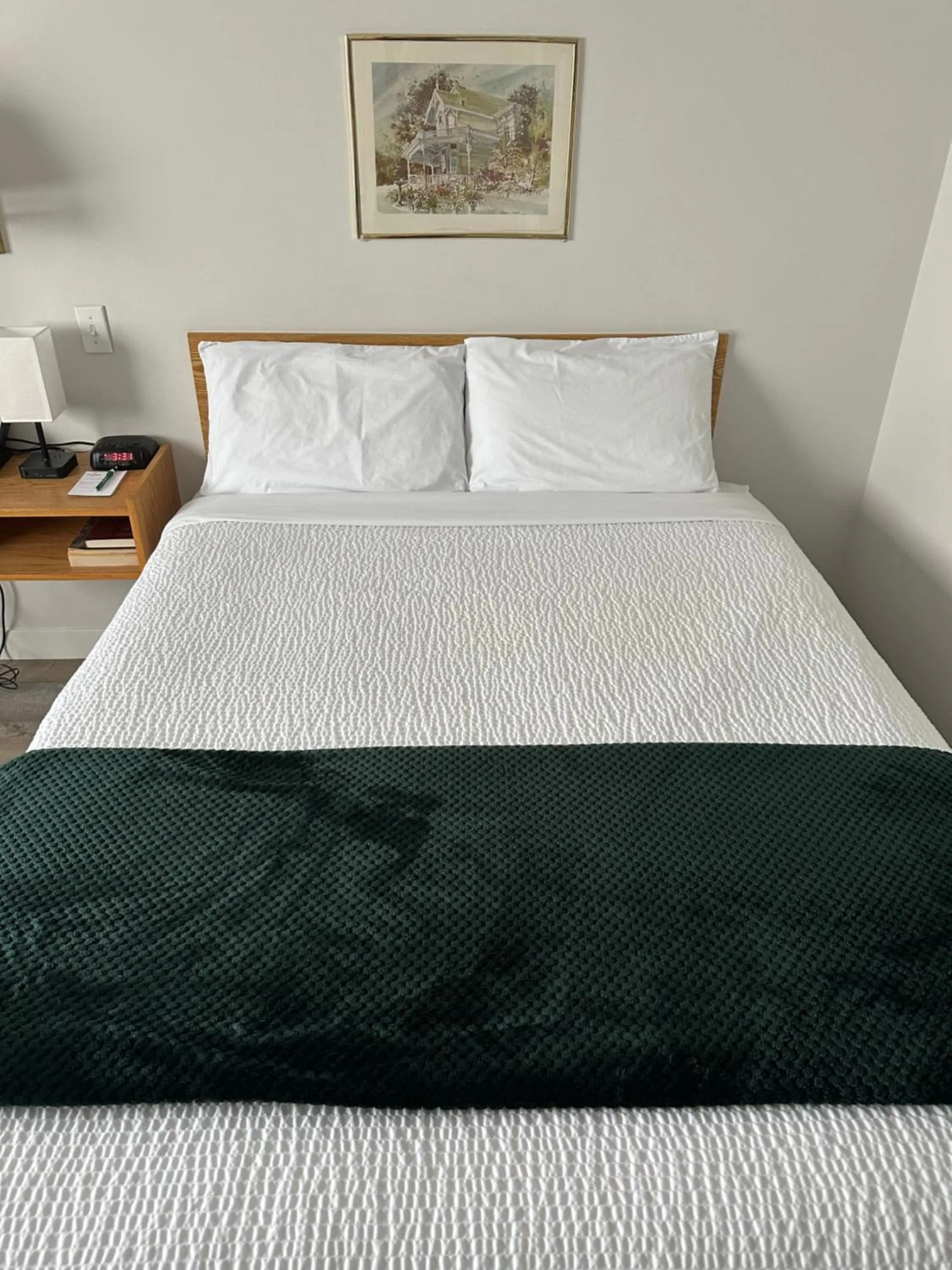 Bed in Sleep Suite Motel