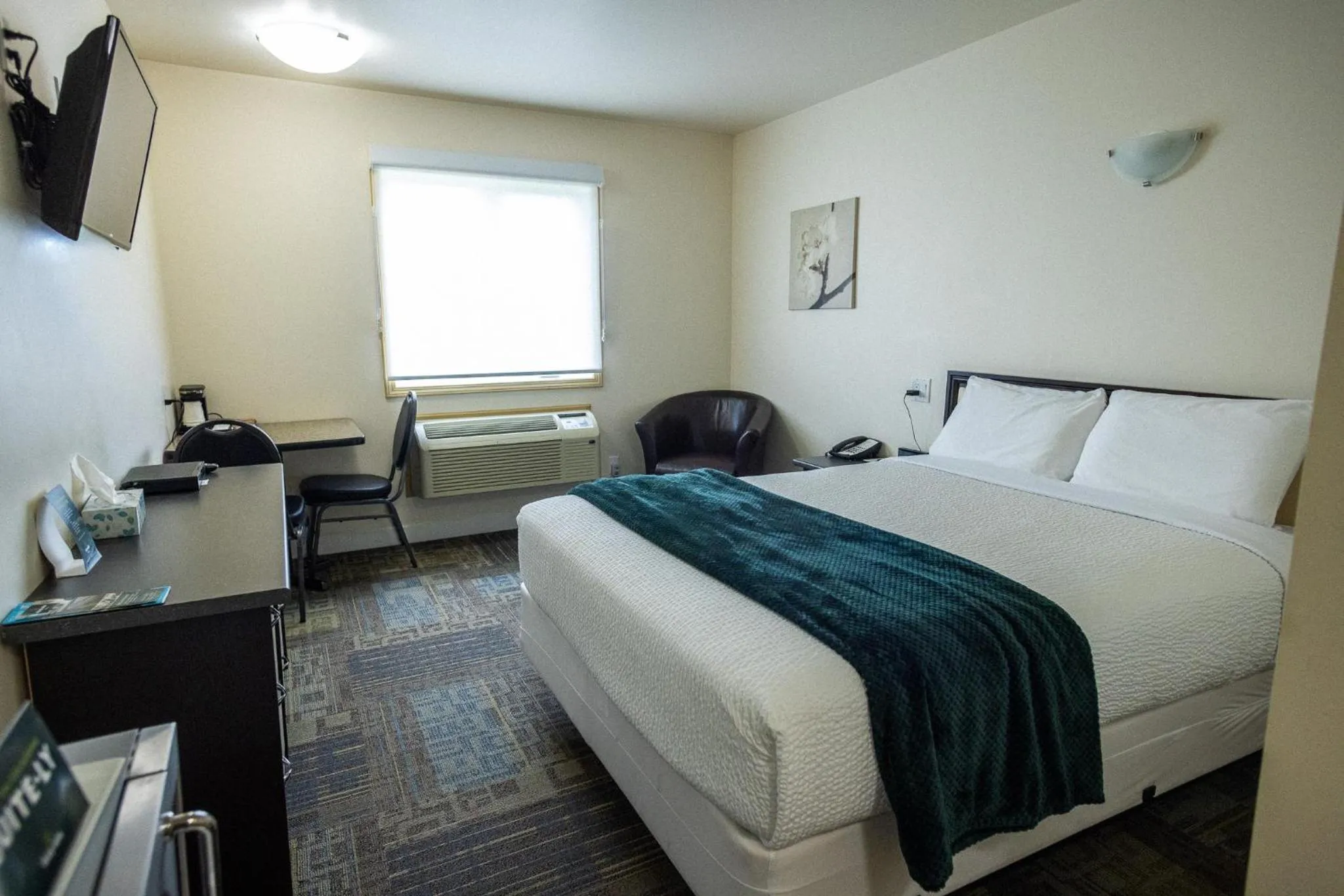 Bed in Sleep Suite Motel