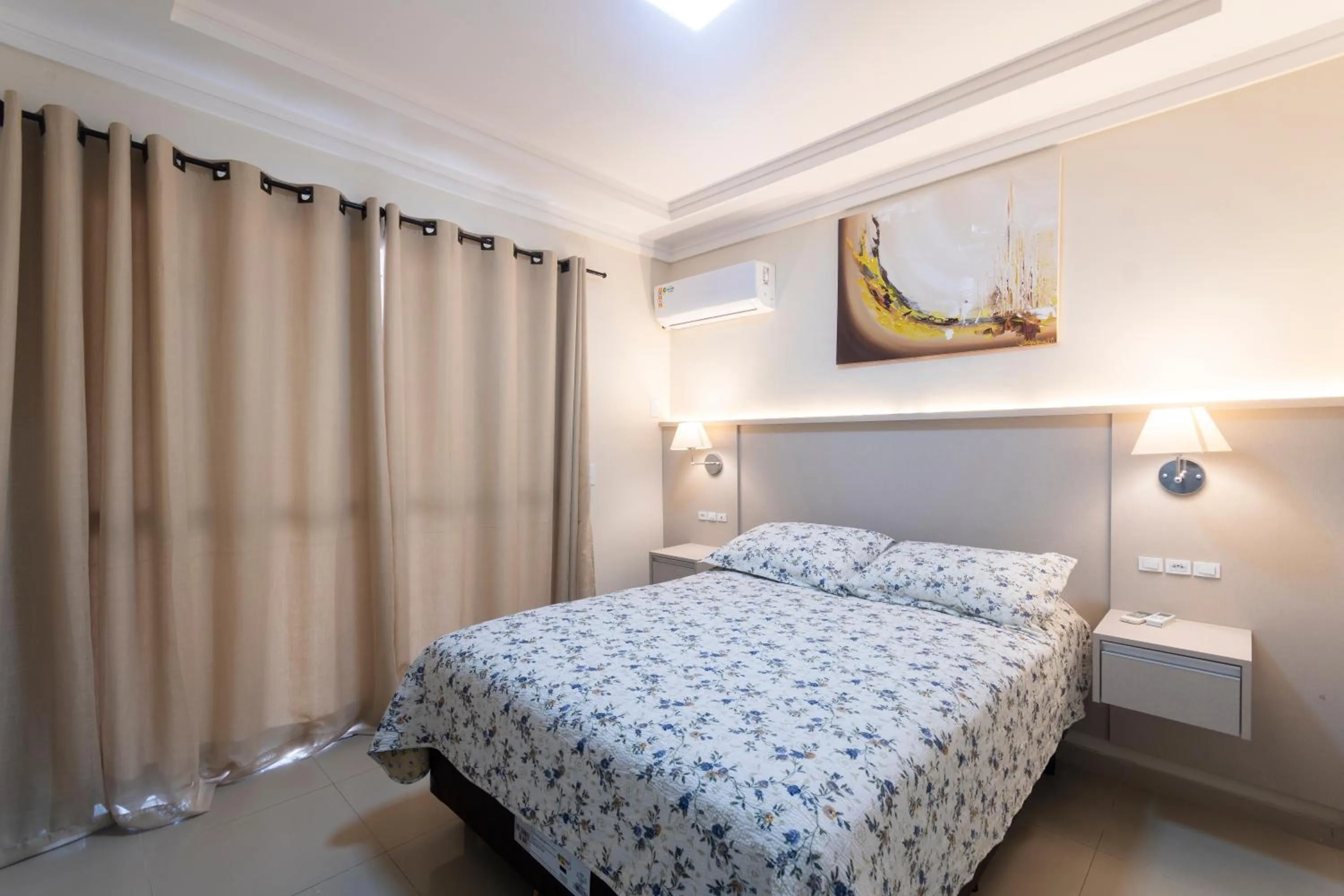 Bed in Bombinhas Tourist Apart