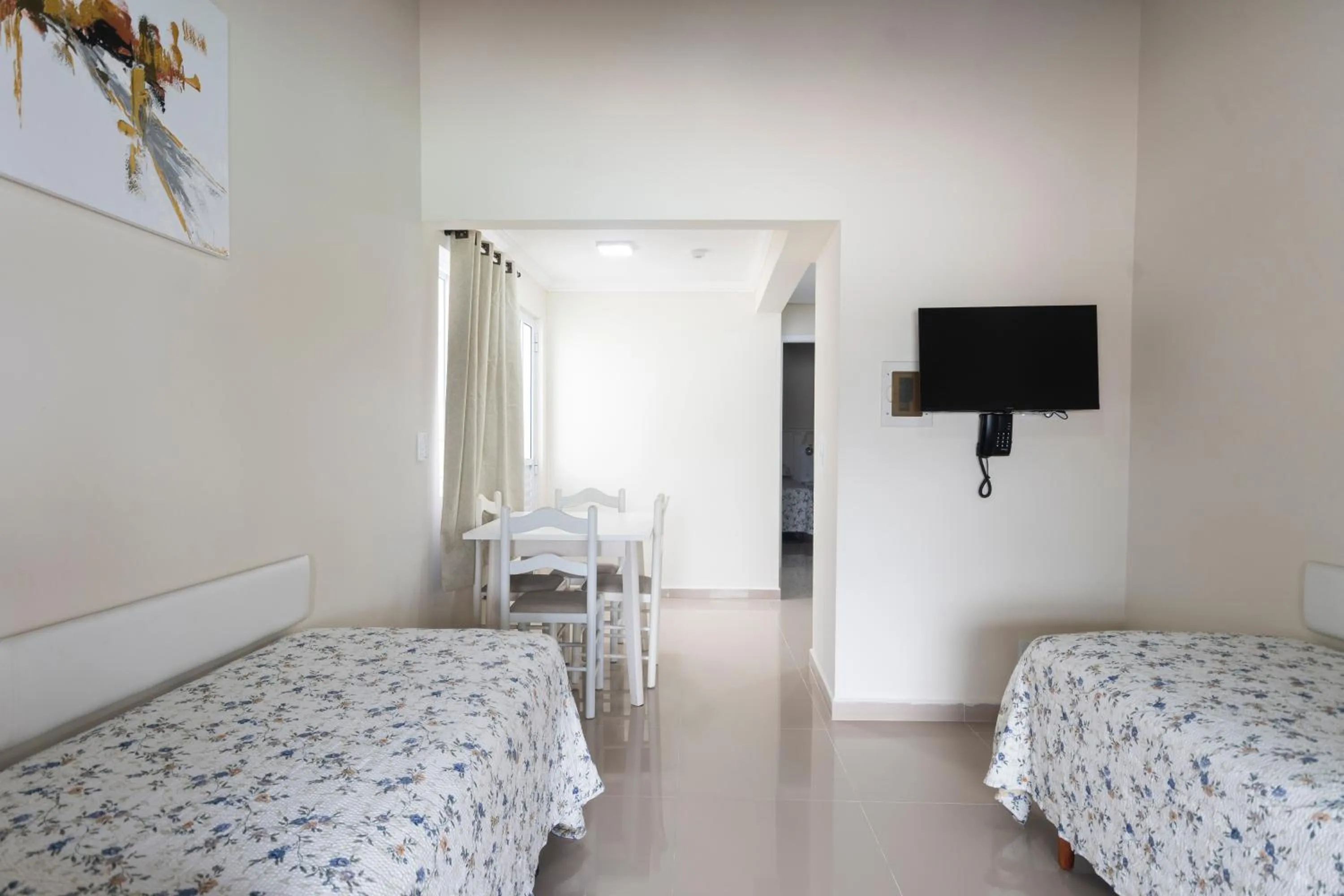 Bed in Bombinhas Tourist Apart