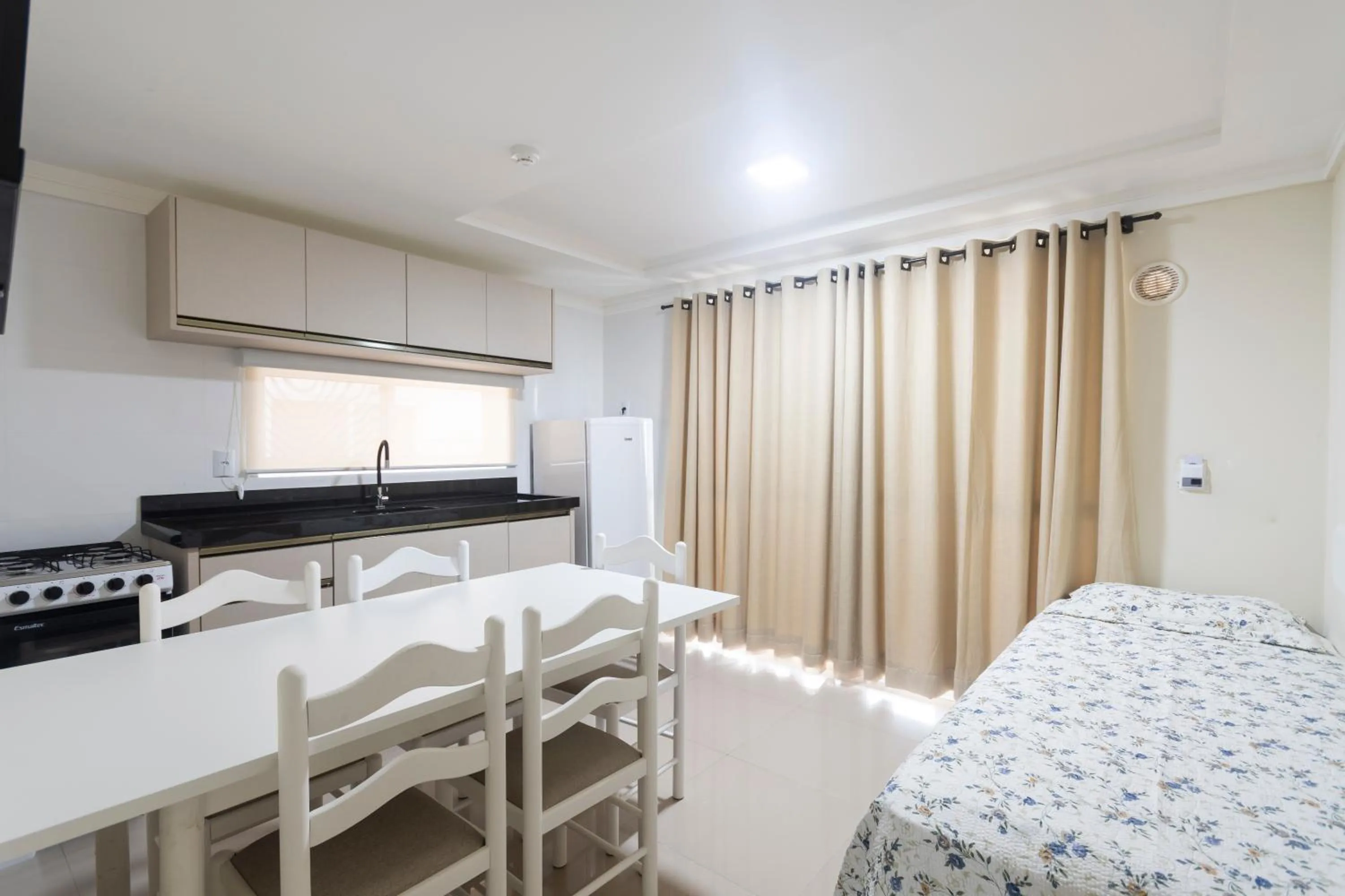 Bed in Bombinhas Tourist Apart