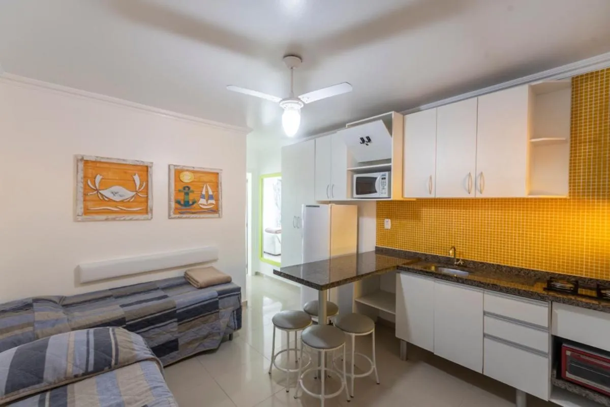 Kitchen or kitchenette in Bombinhas Tourist Apart