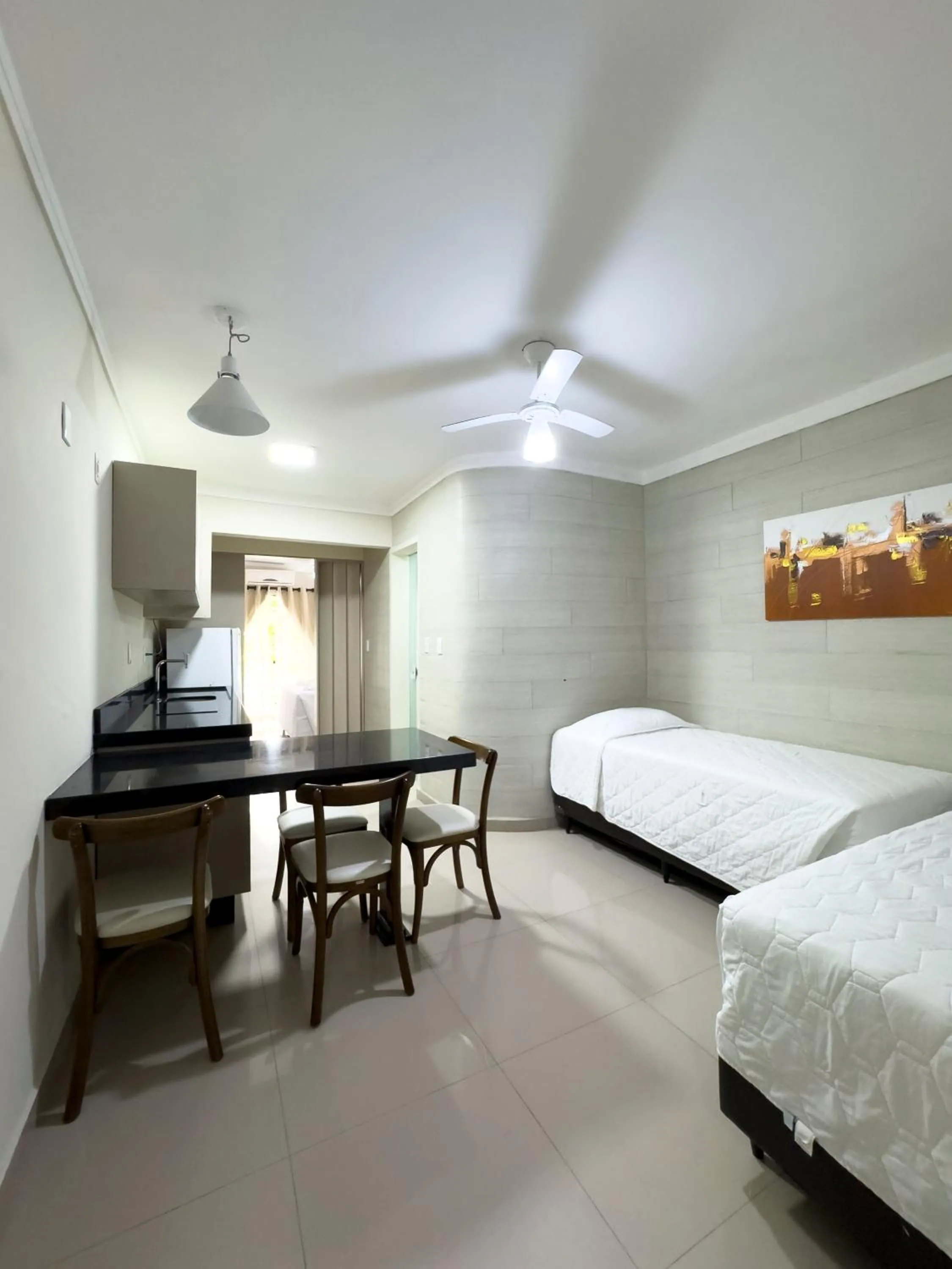 Bed in Bombinhas Tourist Apart