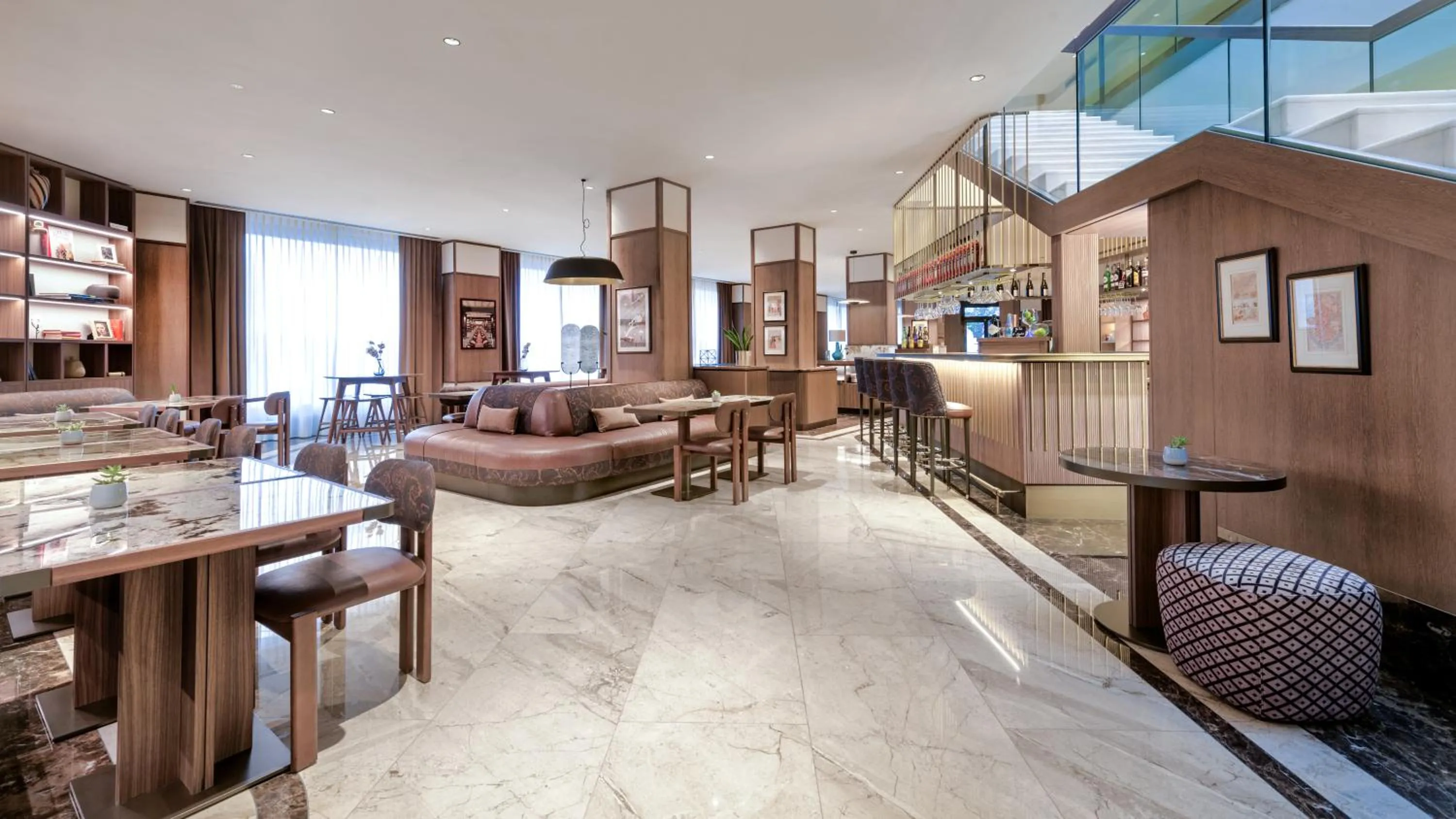 Communal lounge/ TV room in AC Hotel Milano by Marriott