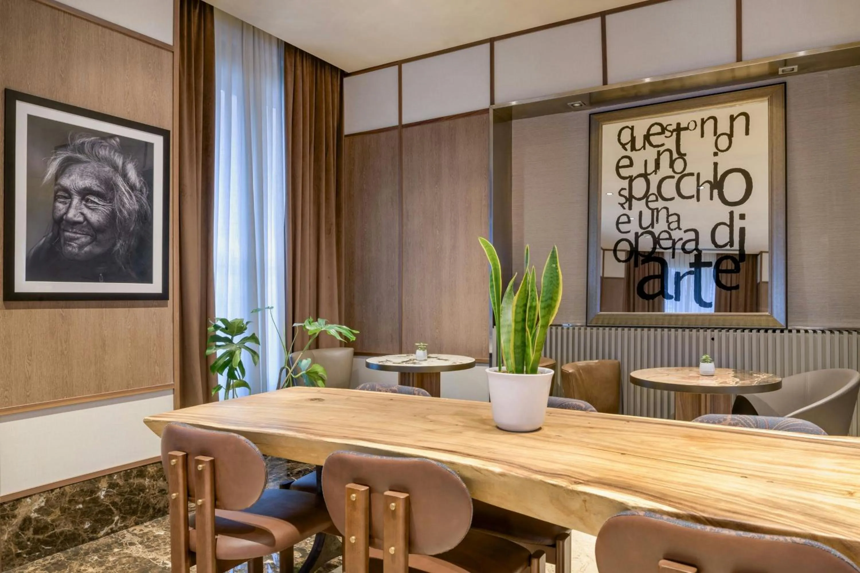Lounge or bar in AC Hotel Milano by Marriott