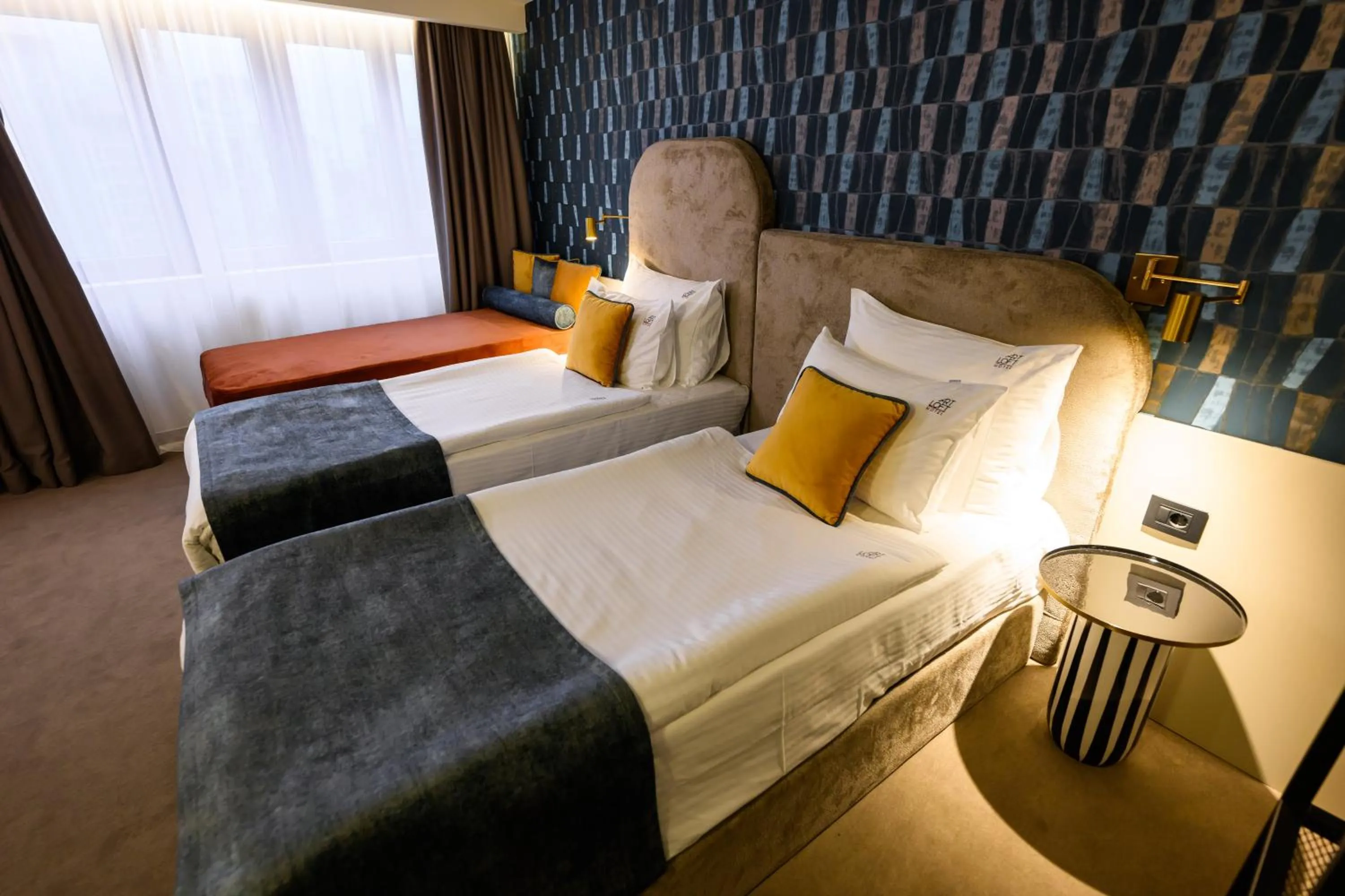 Bed in ArtLoft Garni Hotel
