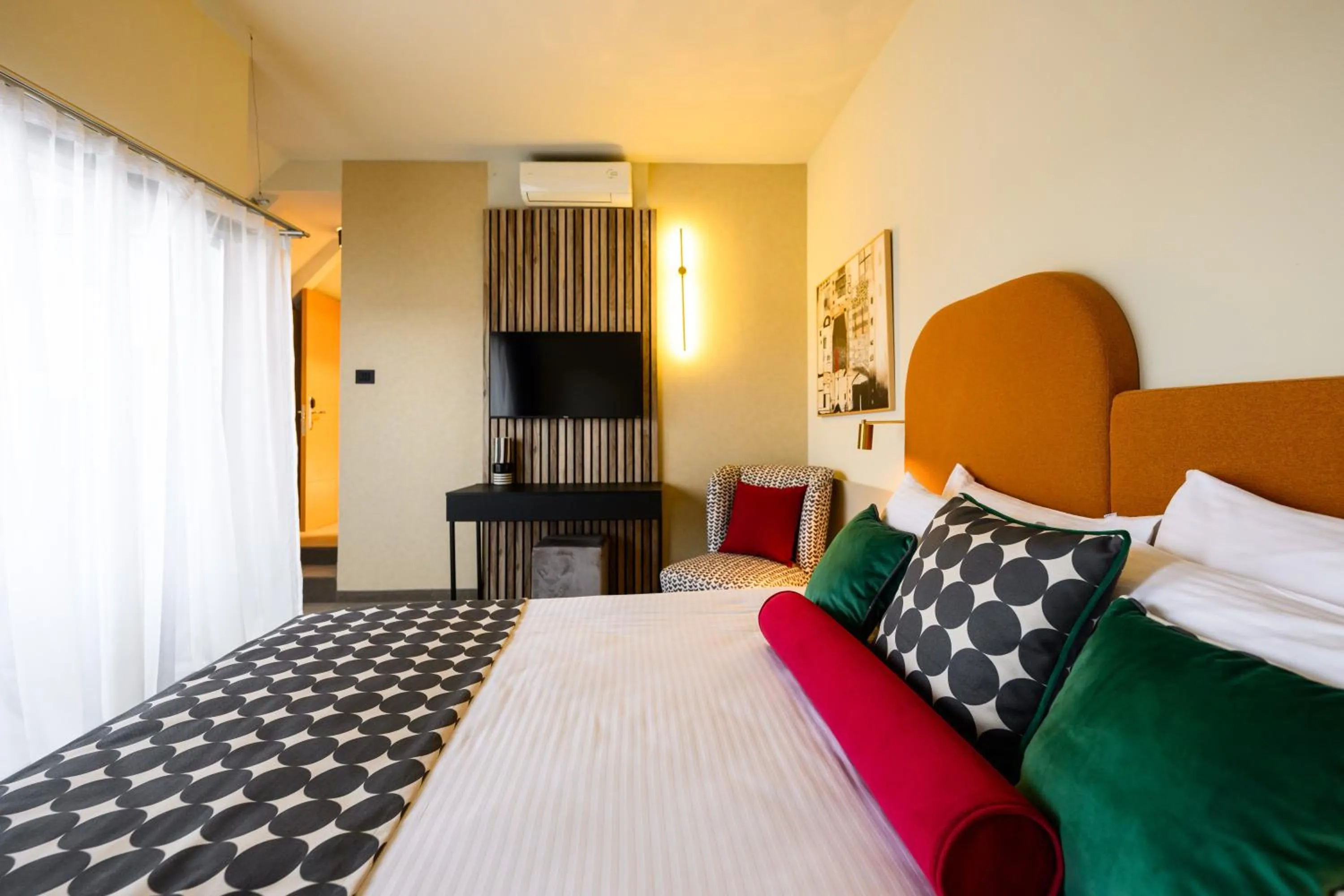 Bed in ArtLoft Garni Hotel